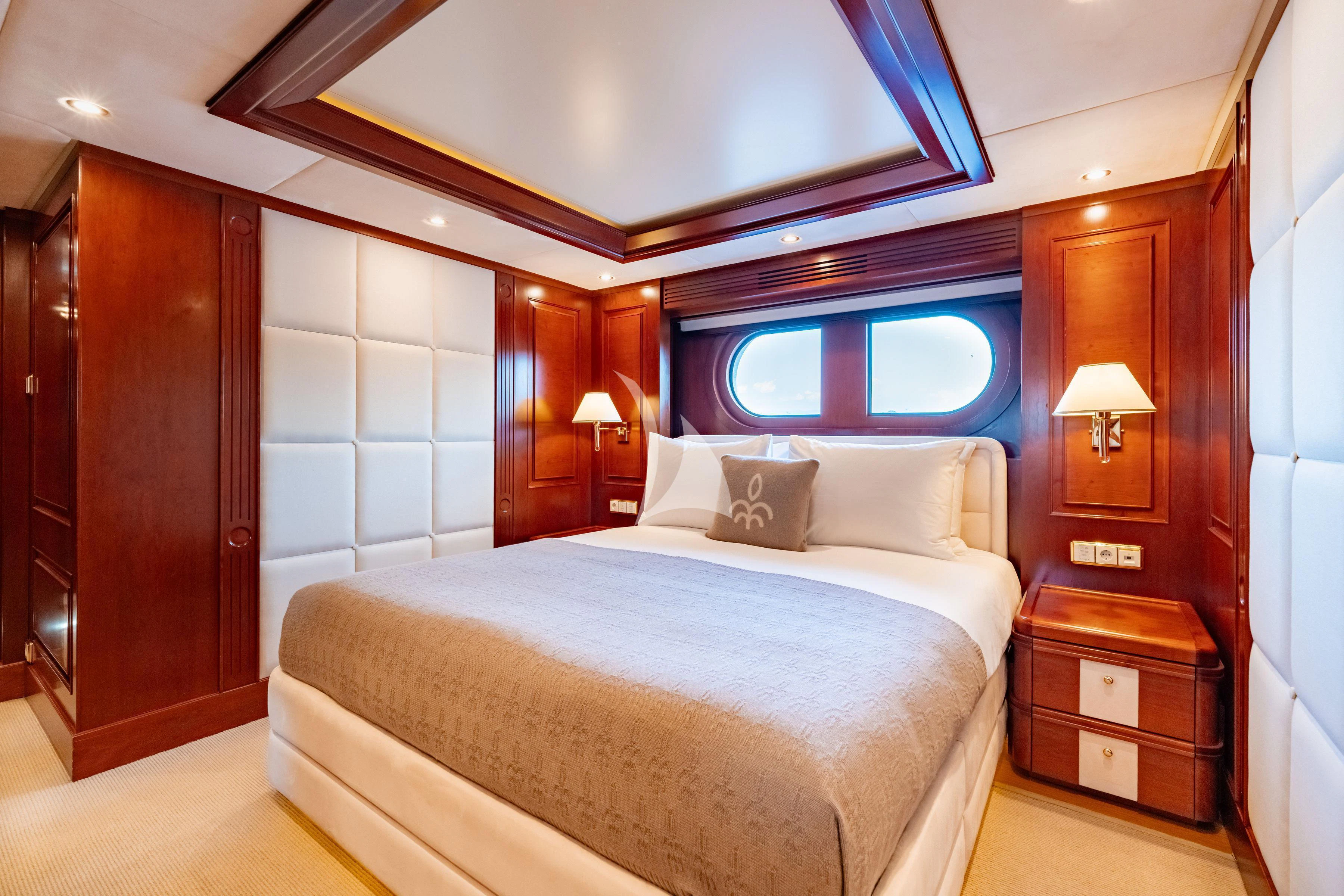 a bed in a room aboard TIREA Yacht for Sale