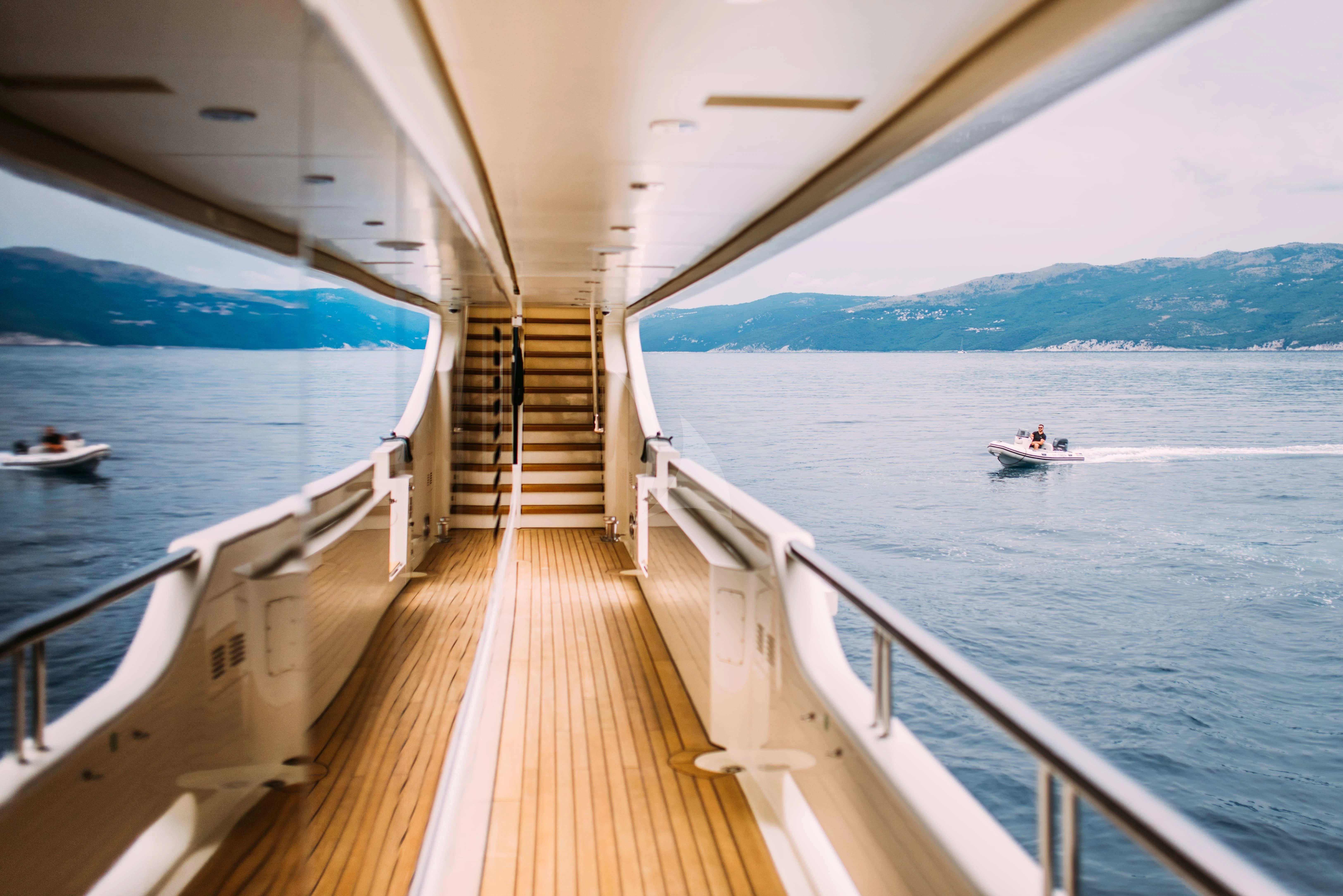 a wooden walkway over water aboard TIREA Yacht for Sale