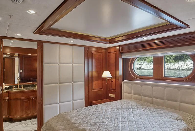 a bed in a room aboard TIREA Yacht for Sale