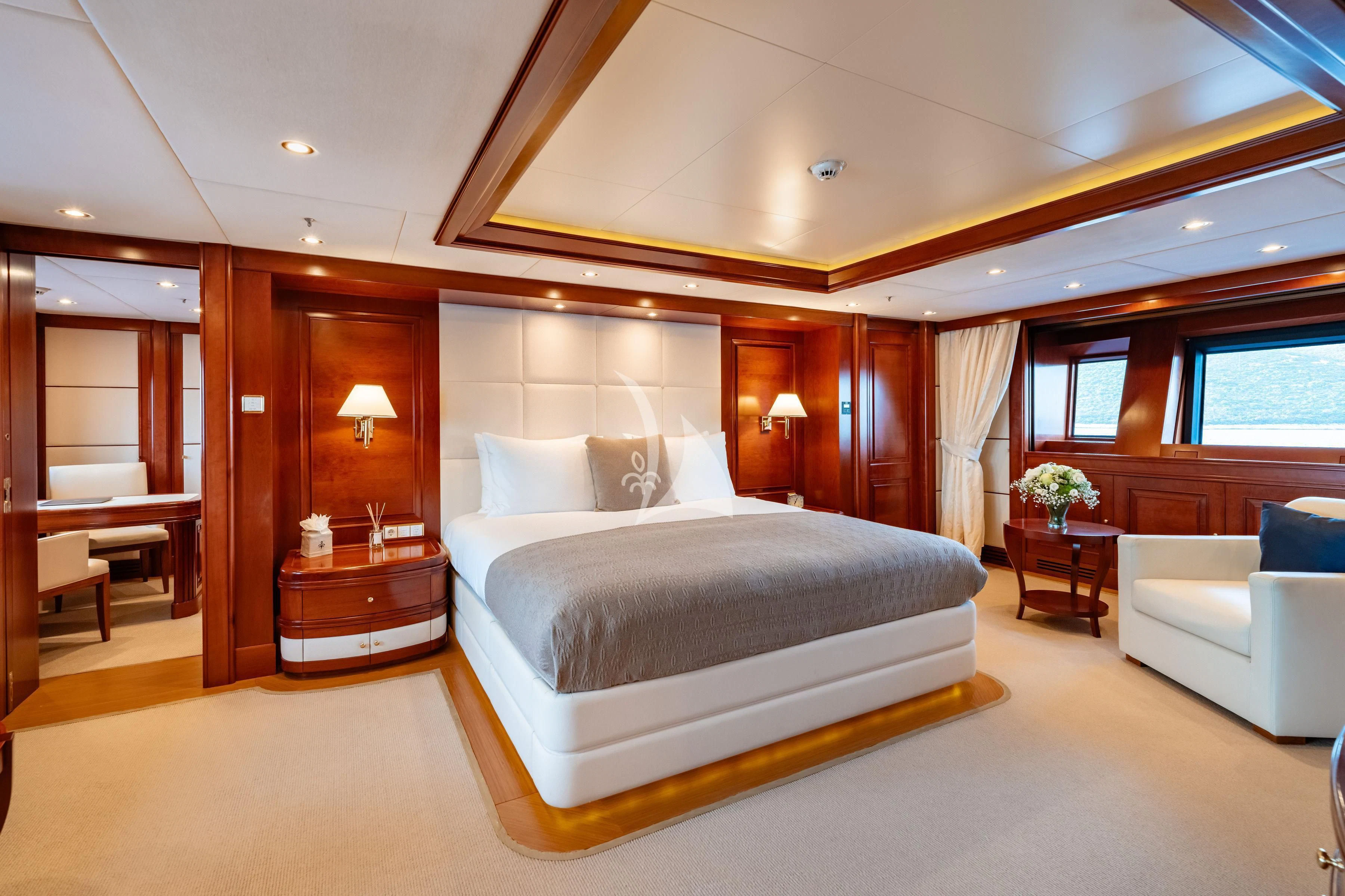 a large bed in a room aboard TIREA Yacht for Sale