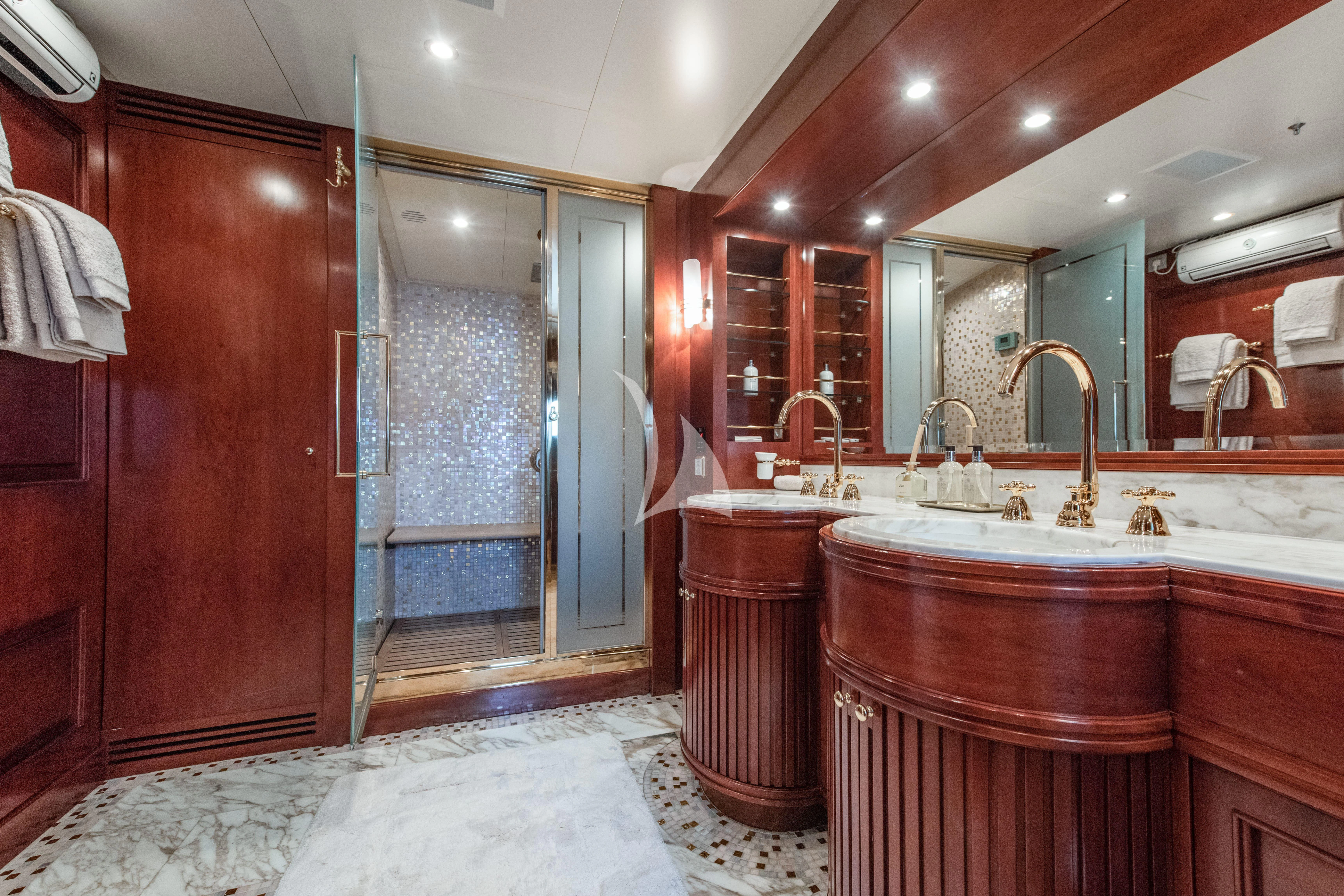 a bathroom with a sink and a shower aboard TIREA Yacht for Sale