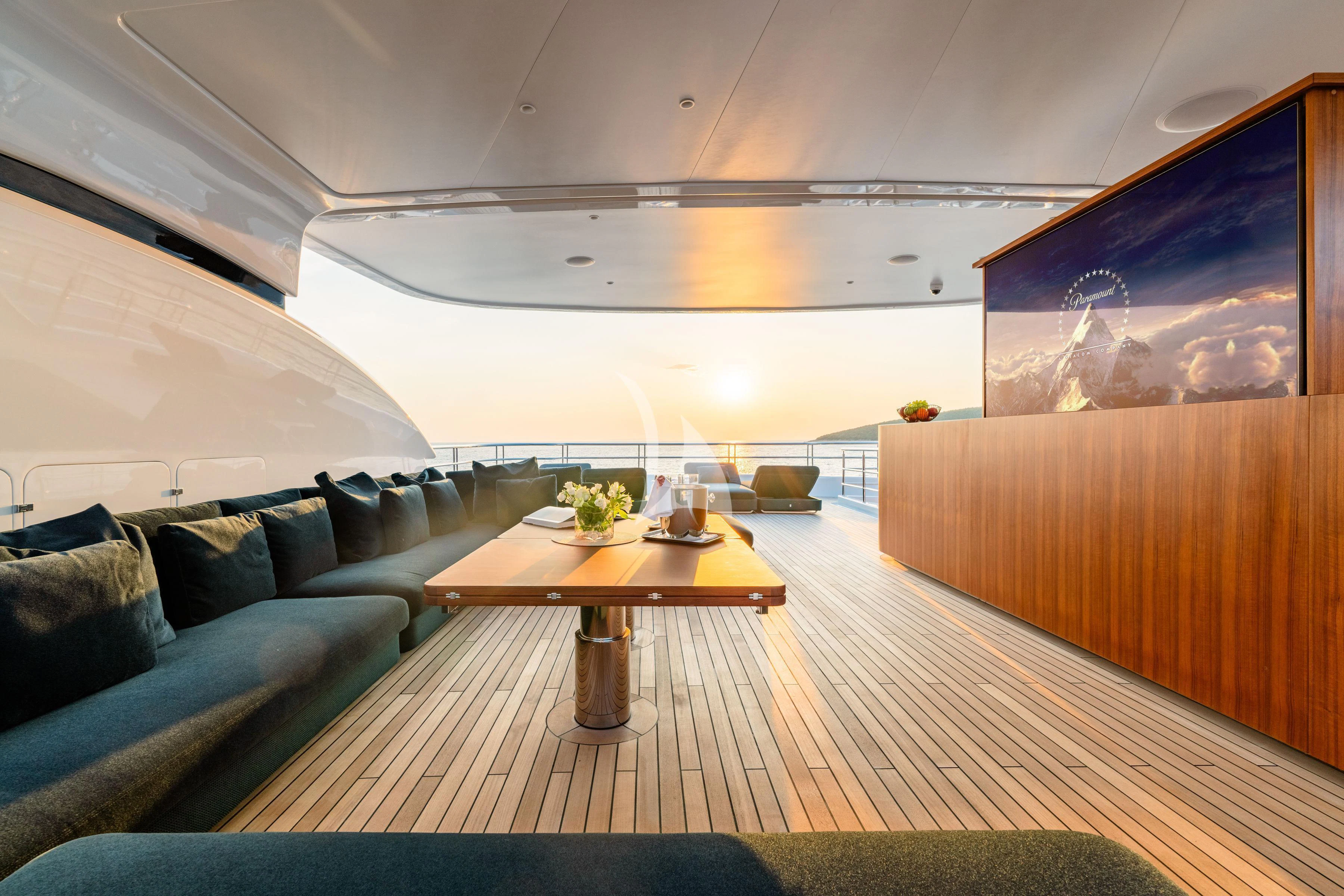 a room with a couch and a coffee table aboard TIREA Yacht for Sale
