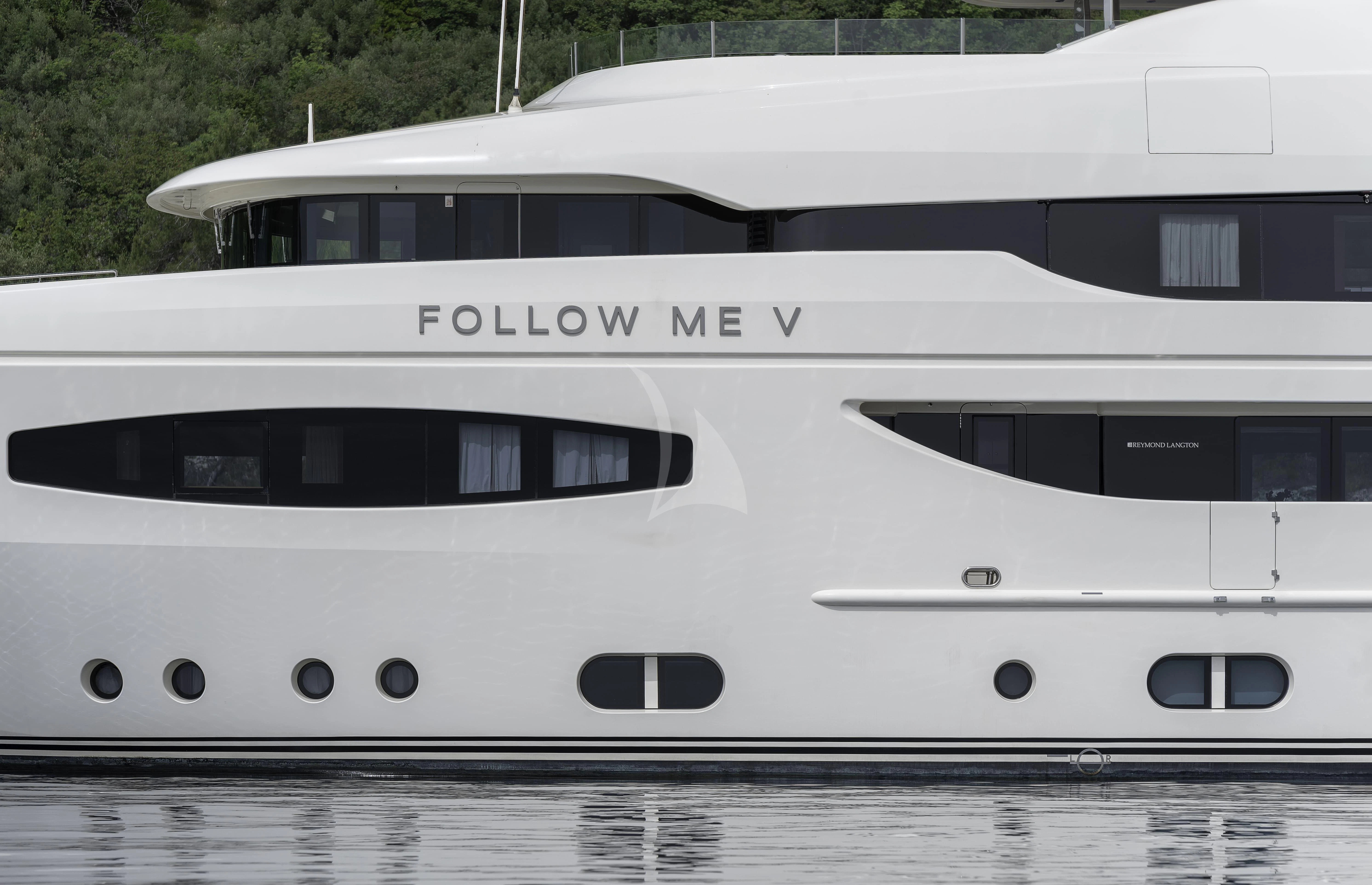 a white yacht on the water aboard TIREA Yacht for Sale