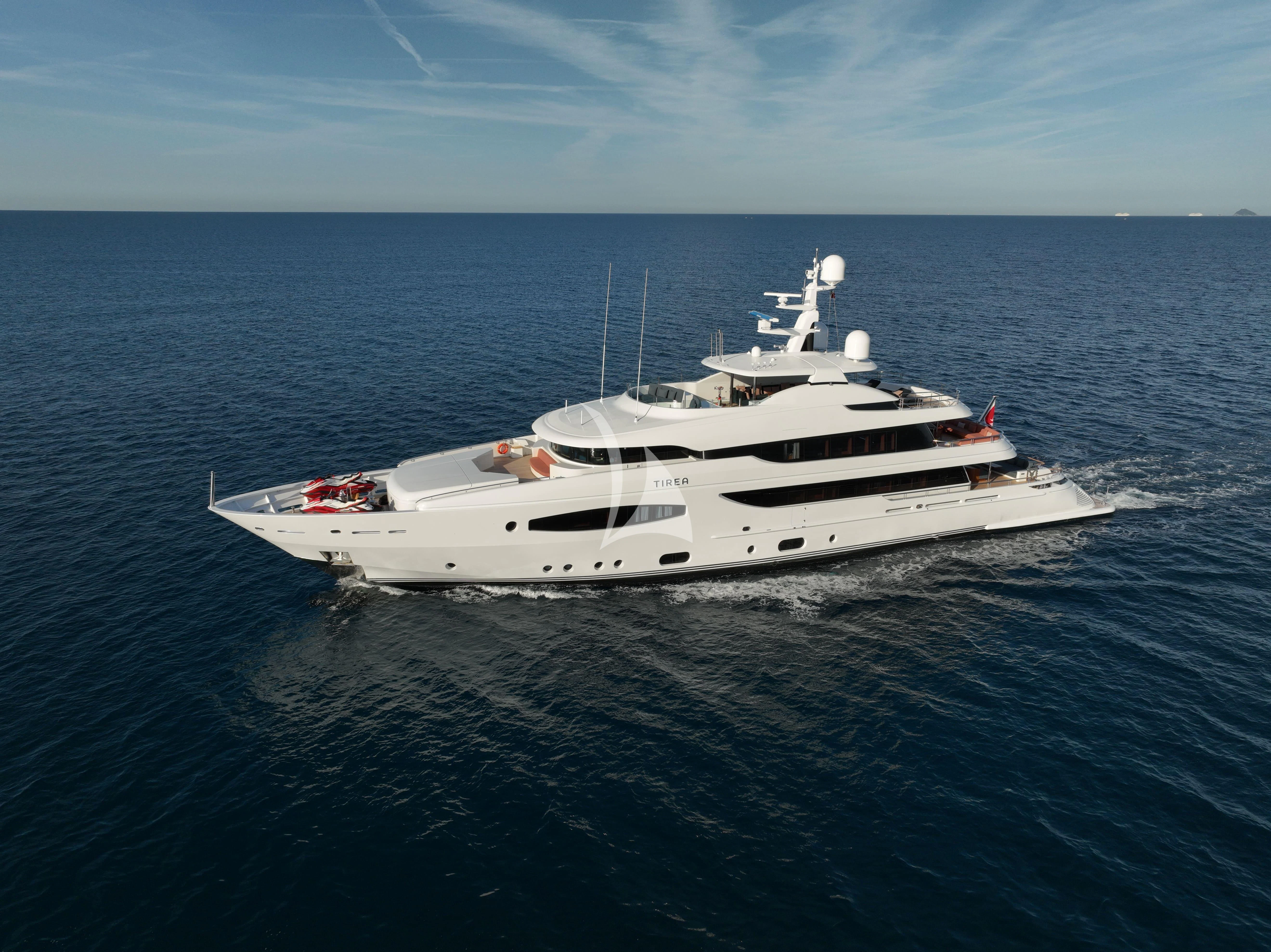 a white yacht in the ocean aboard TIREA Yacht for Sale