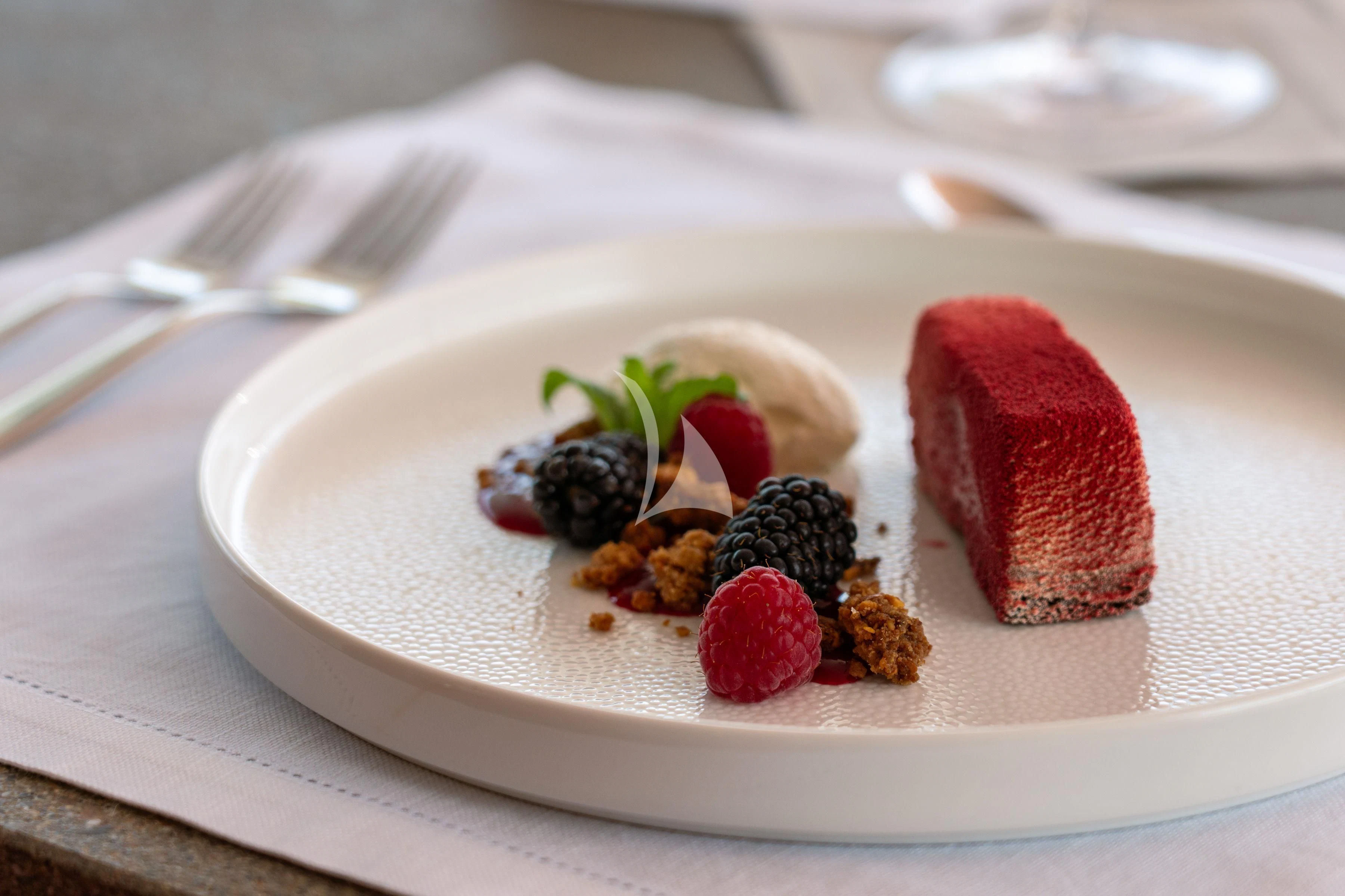 a plate of food aboard TIREA Yacht for Sale
