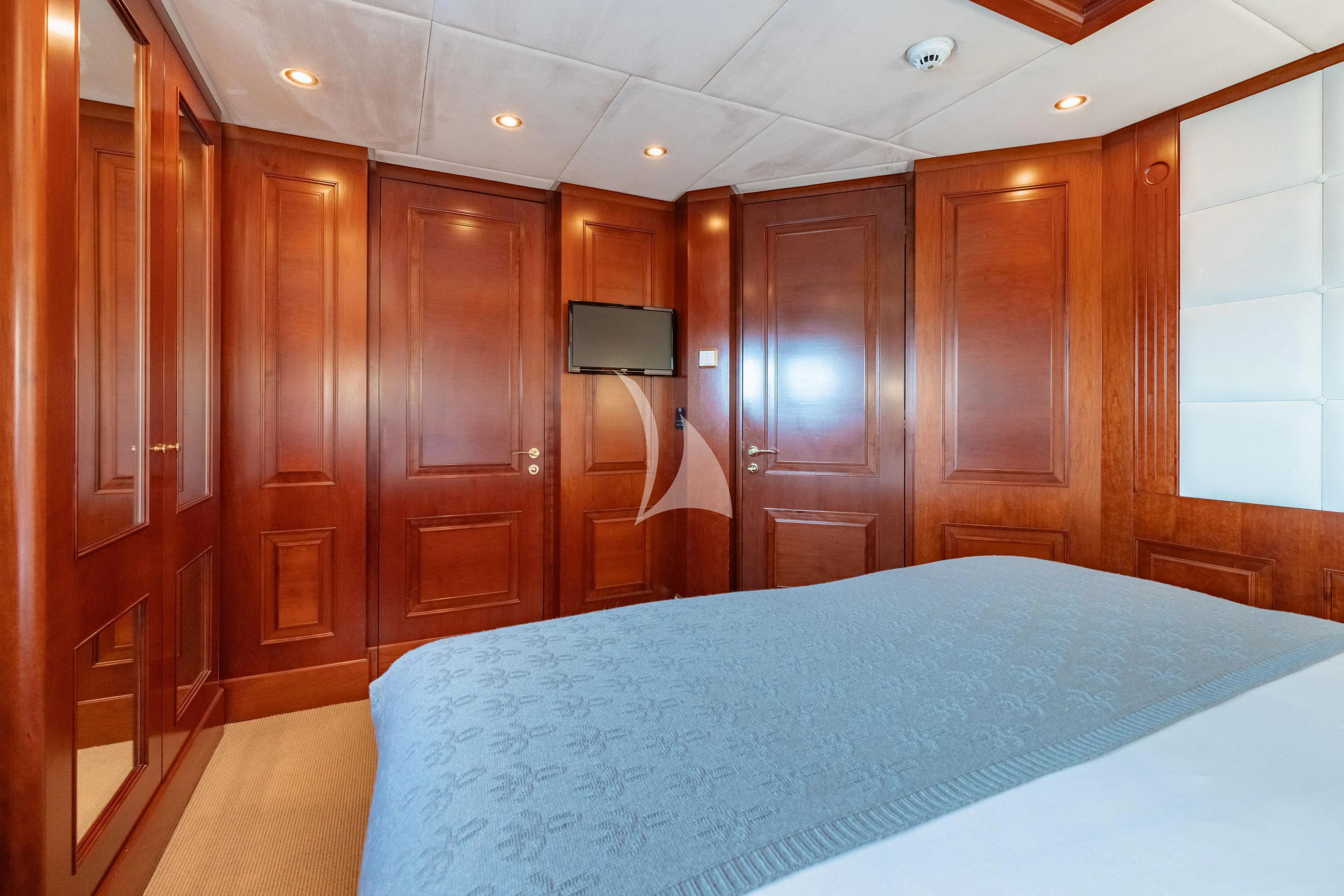a bed in a room aboard TIREA Yacht for Sale
