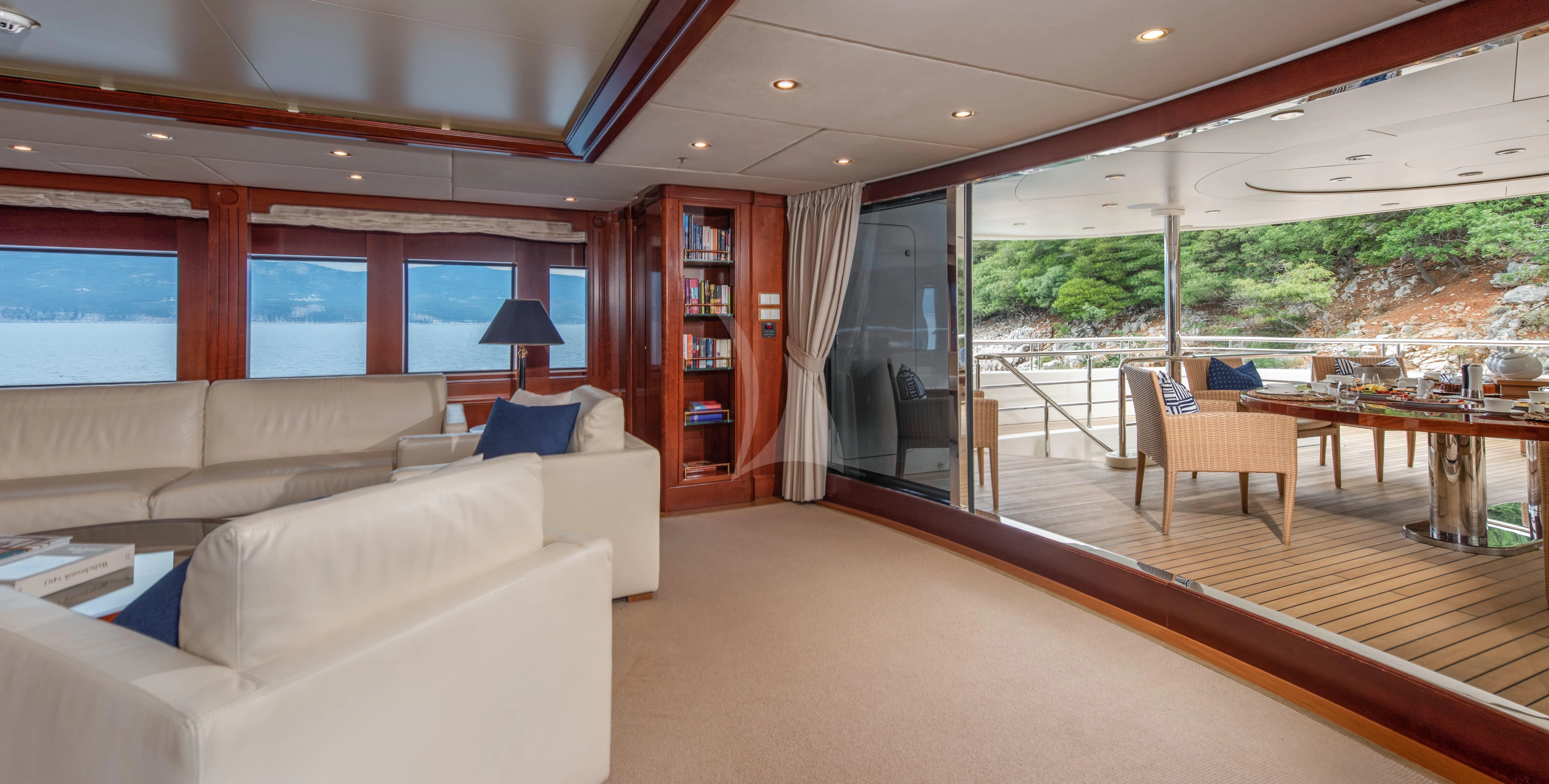 a living room with a large window aboard TIREA Yacht for Sale