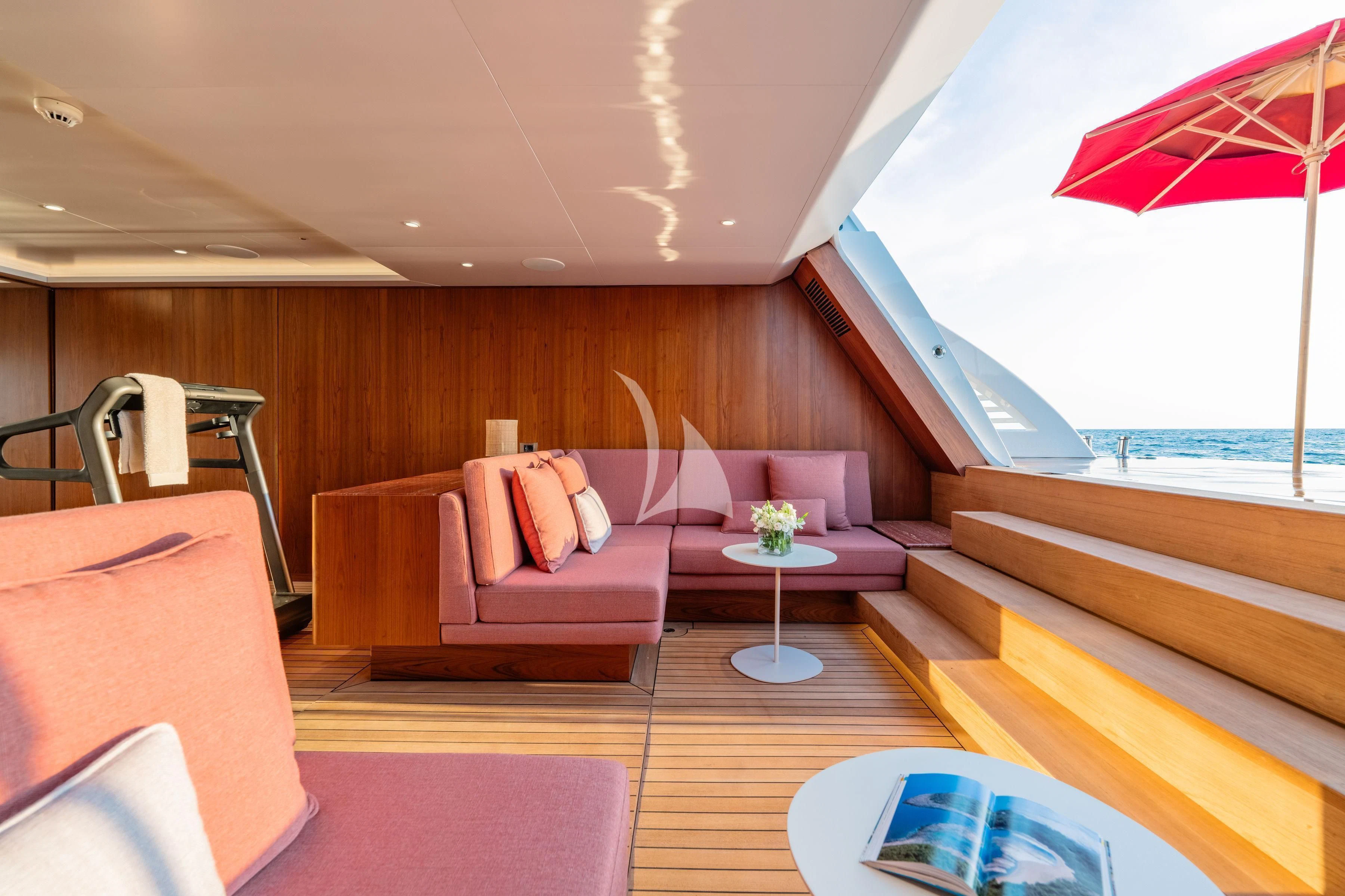a room with a couch and a table and chairs aboard TIREA Yacht for Sale