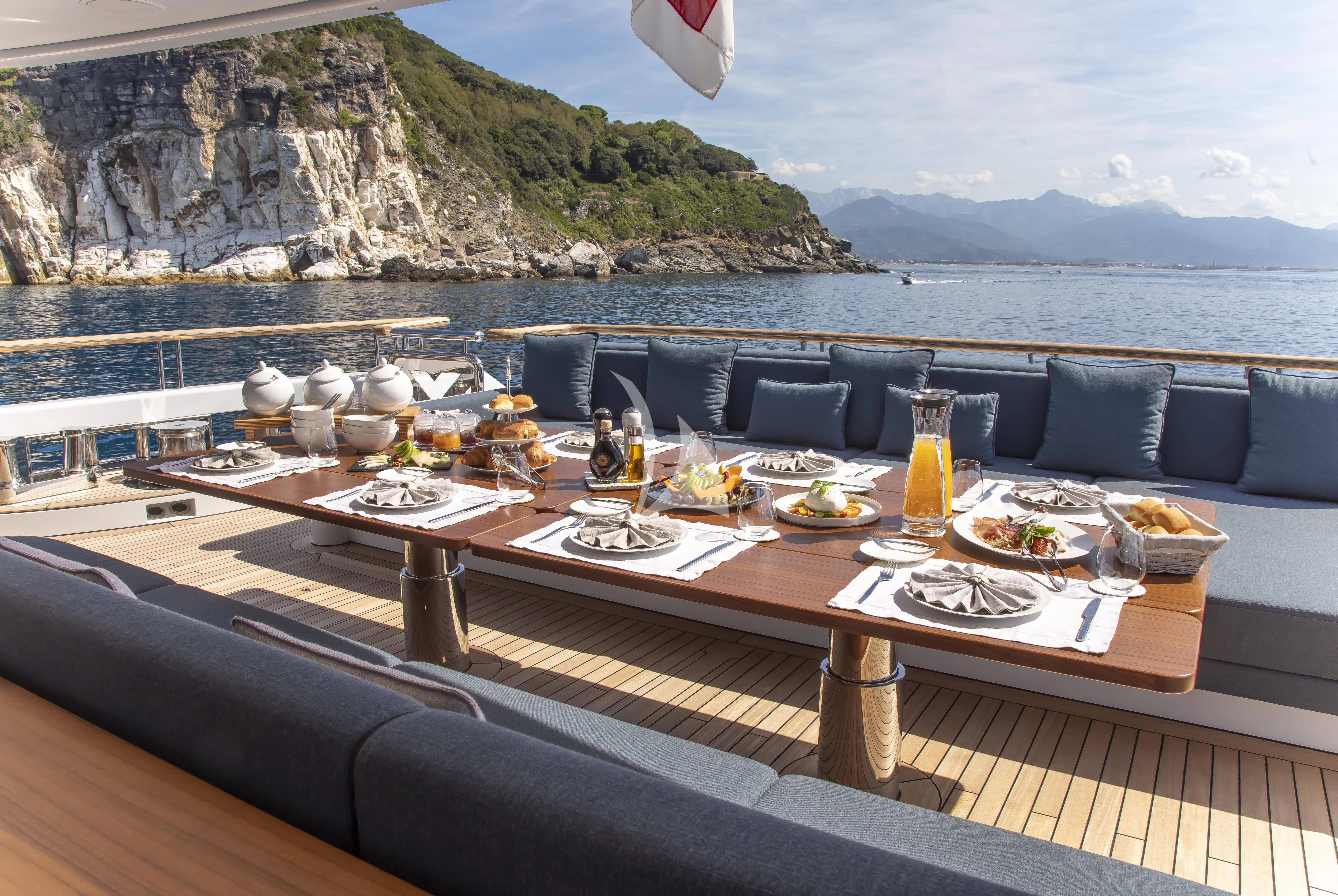 a table with food on it aboard TIREA Yacht for Sale