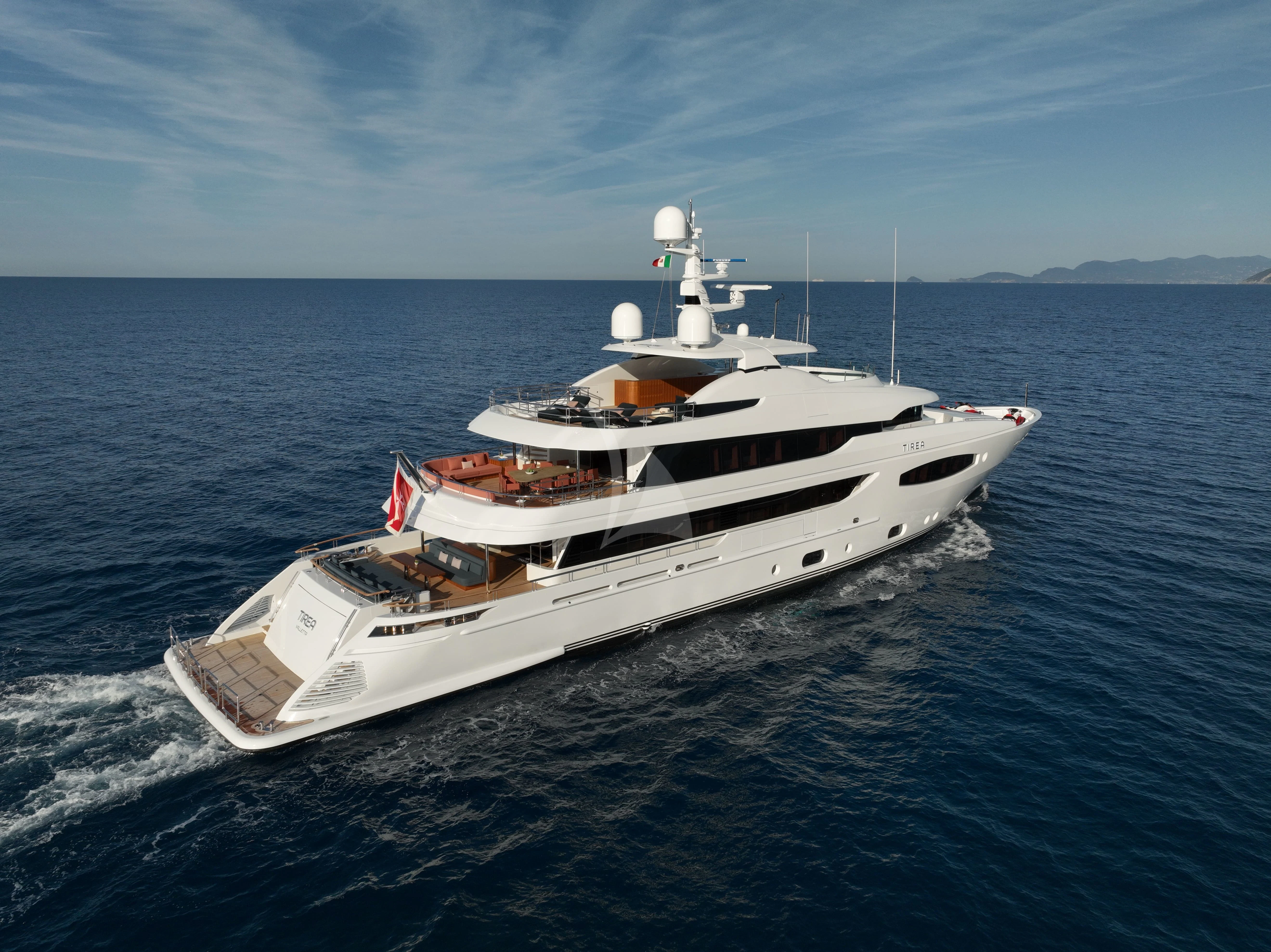 a white boat in the water aboard TIREA Yacht for Sale