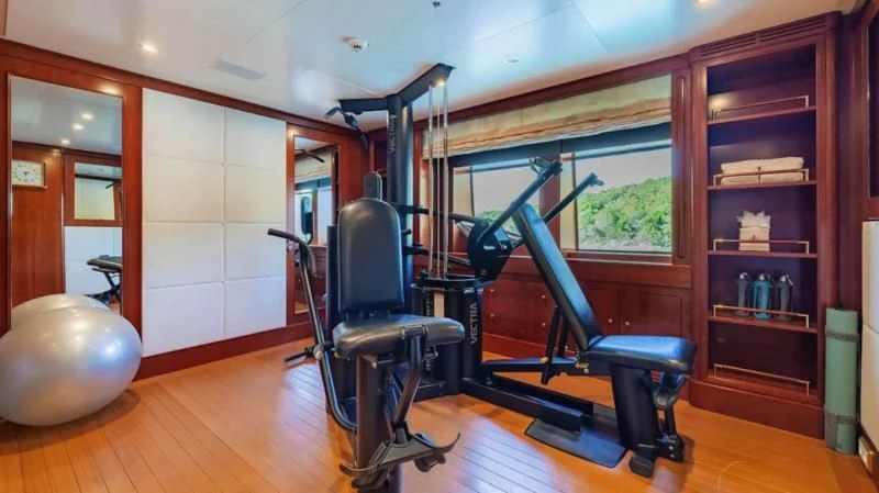 a room with a large exercise ball aboard TIREA Yacht for Sale
