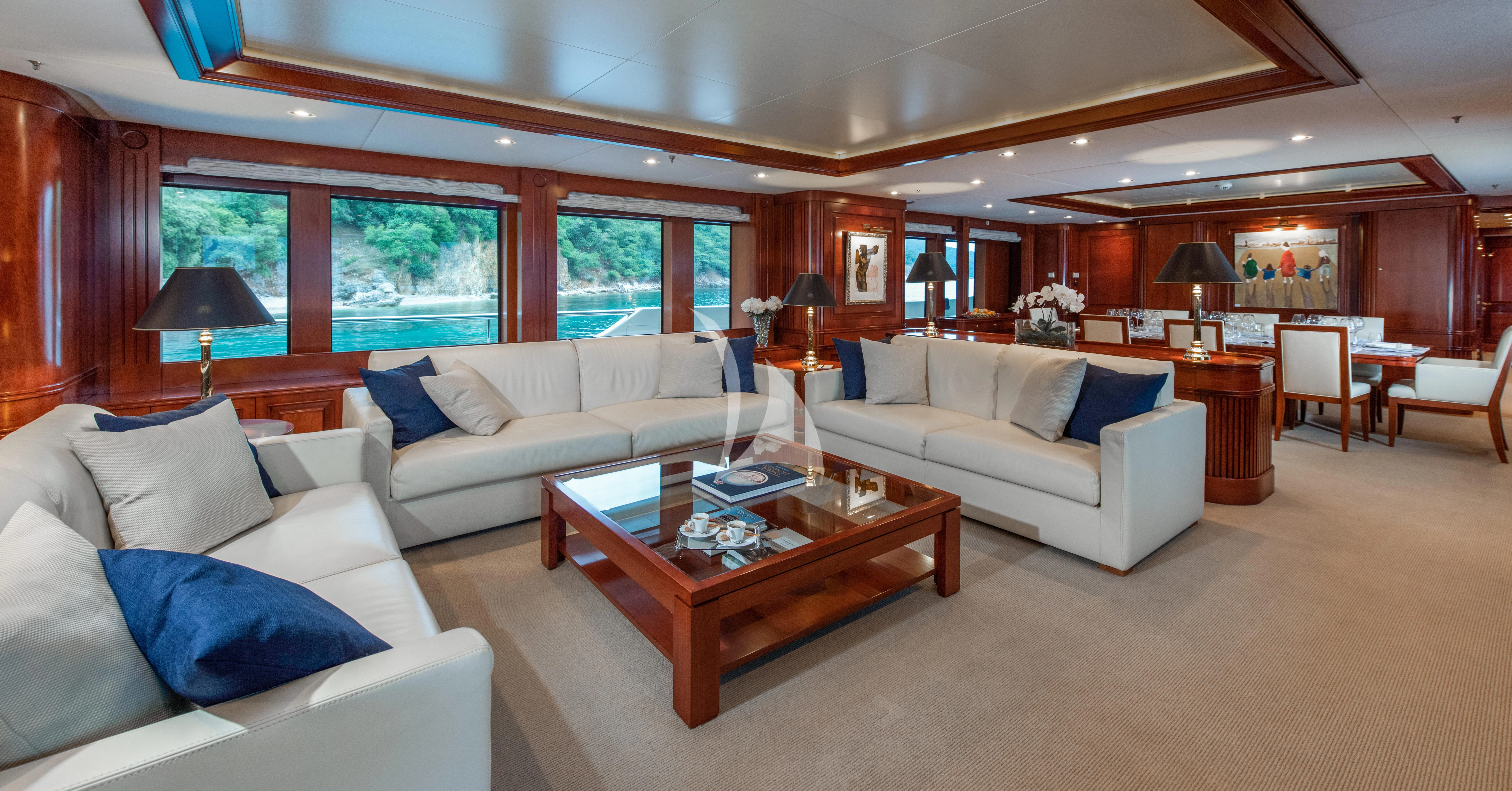 a living room with a large window aboard TIREA Yacht for Sale
