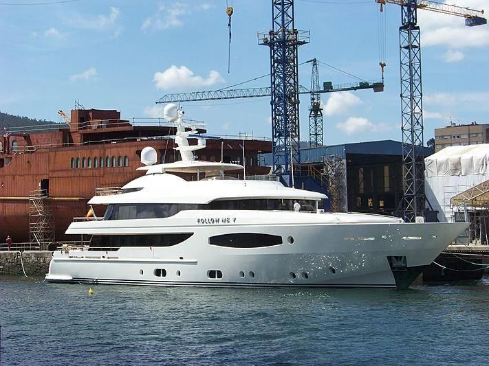a large white boat in the water aboard TIREA Yacht for Sale