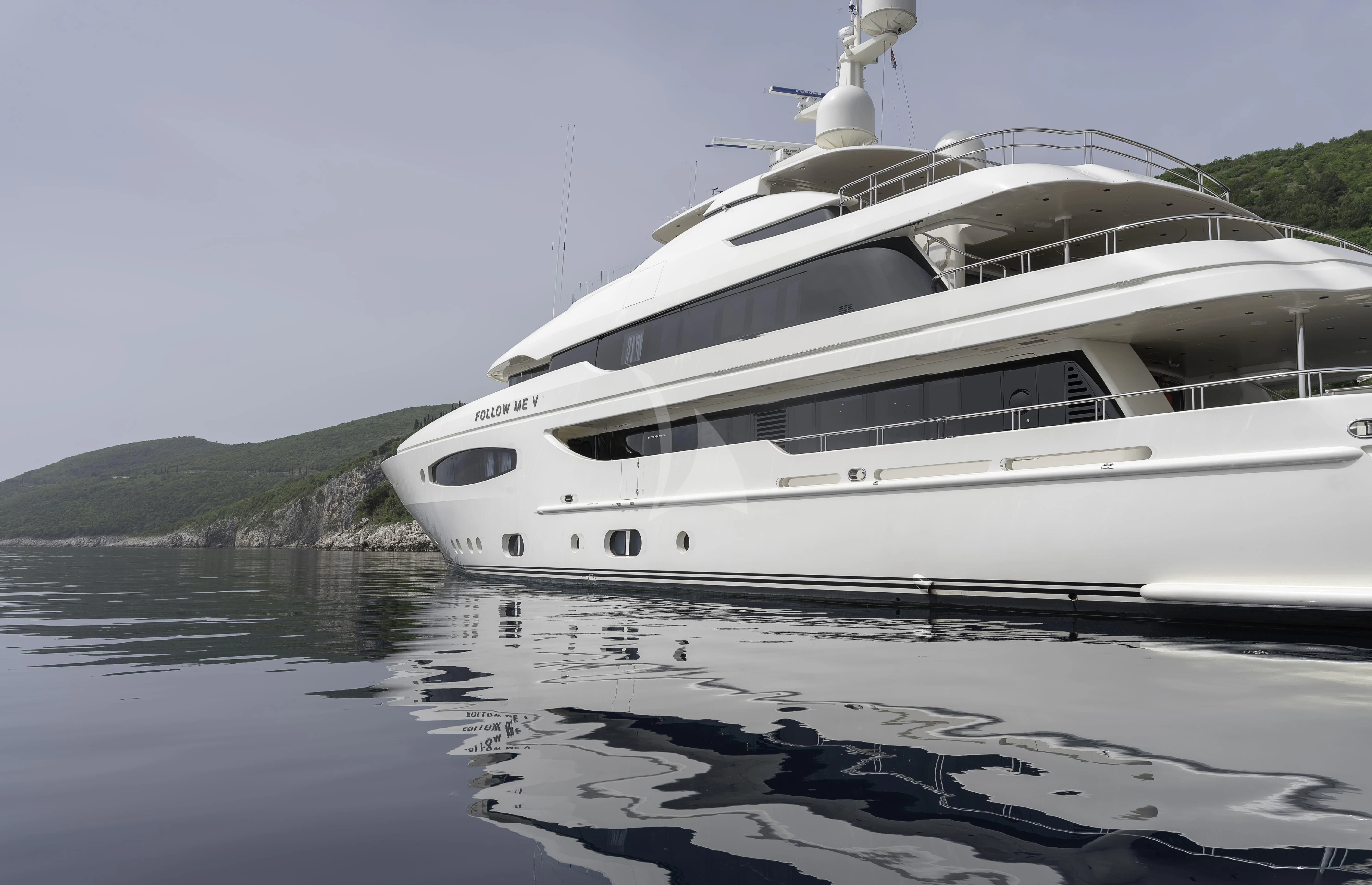 a white yacht on the water aboard TIREA Yacht for Sale