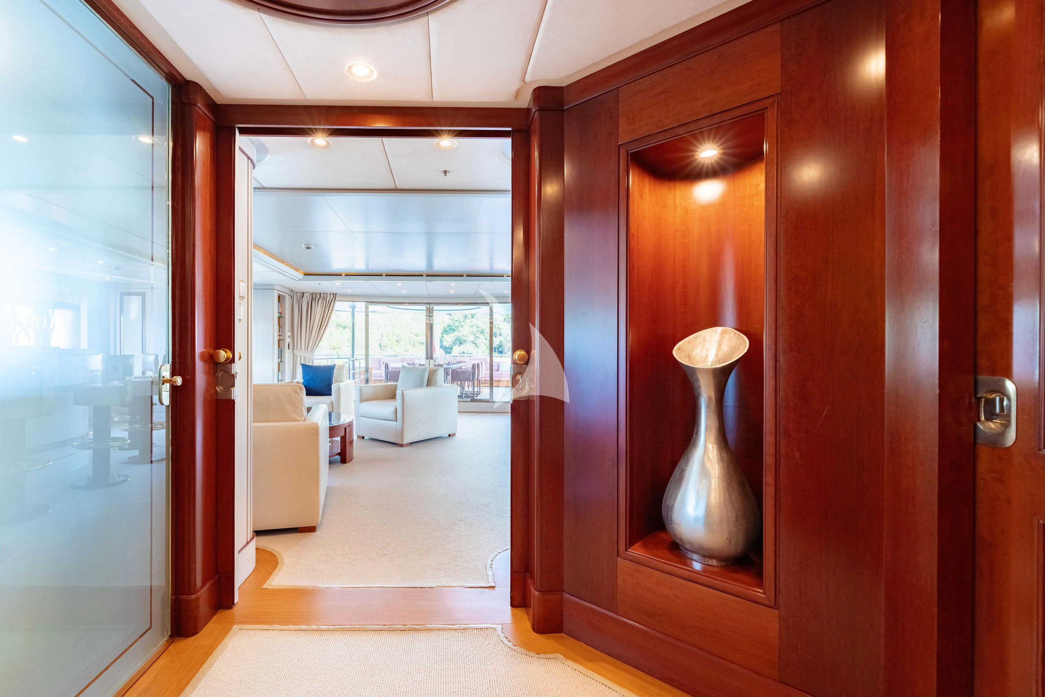 a living room with a vase aboard TIREA Yacht for Sale