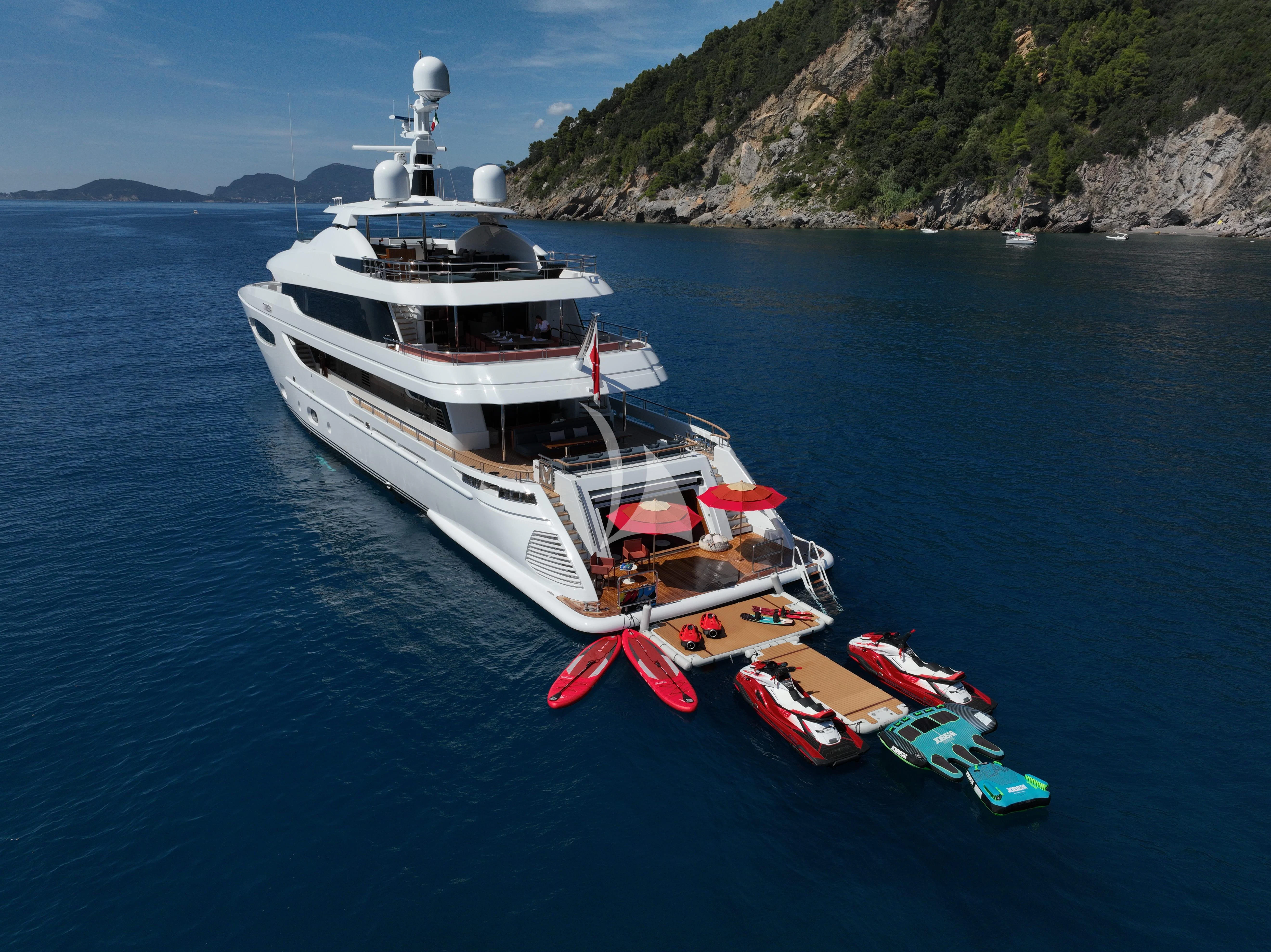 a boat with a boat on it aboard TIREA Yacht for Sale