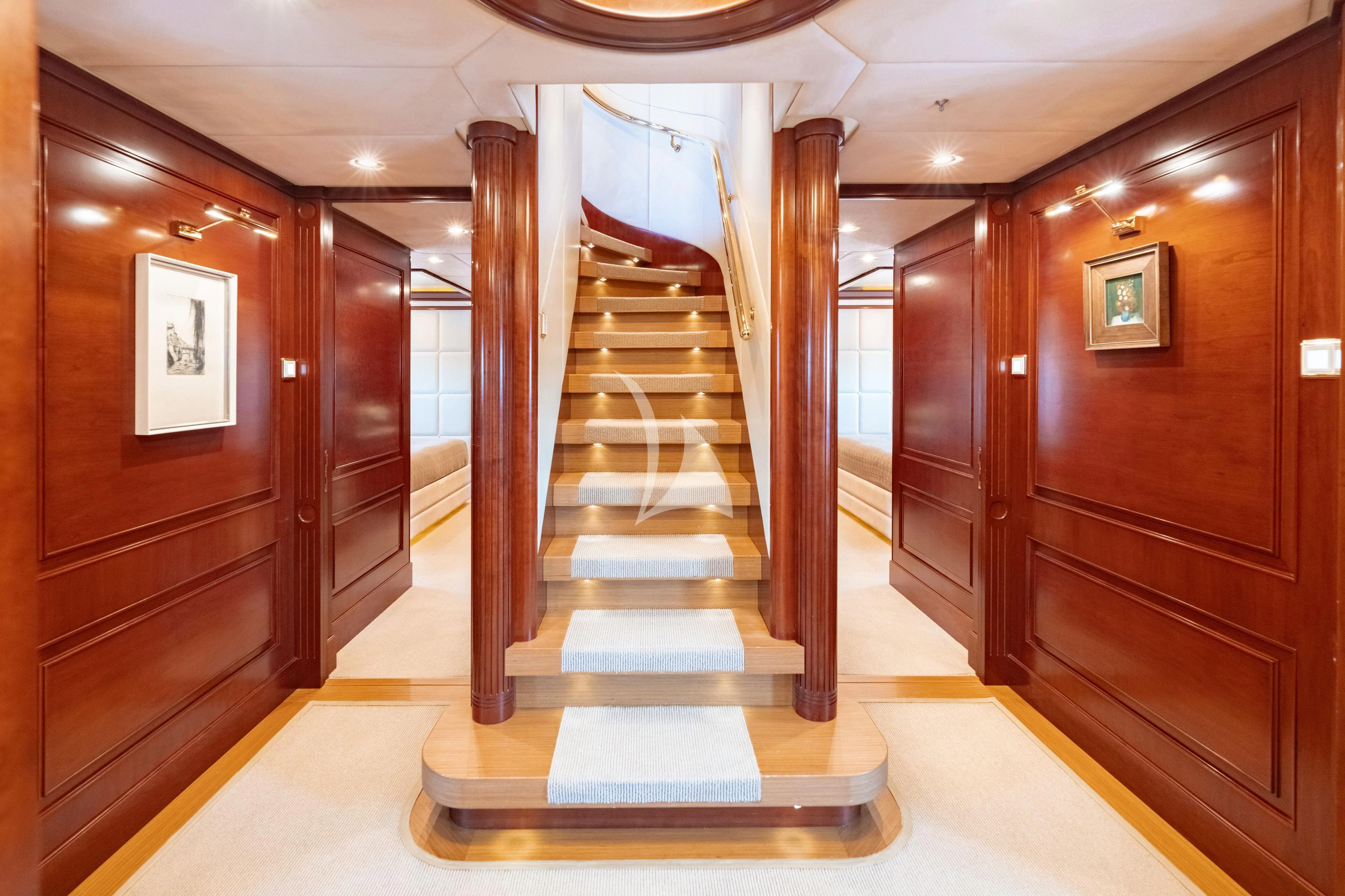 a long hallway with doors aboard TIREA Yacht for Sale