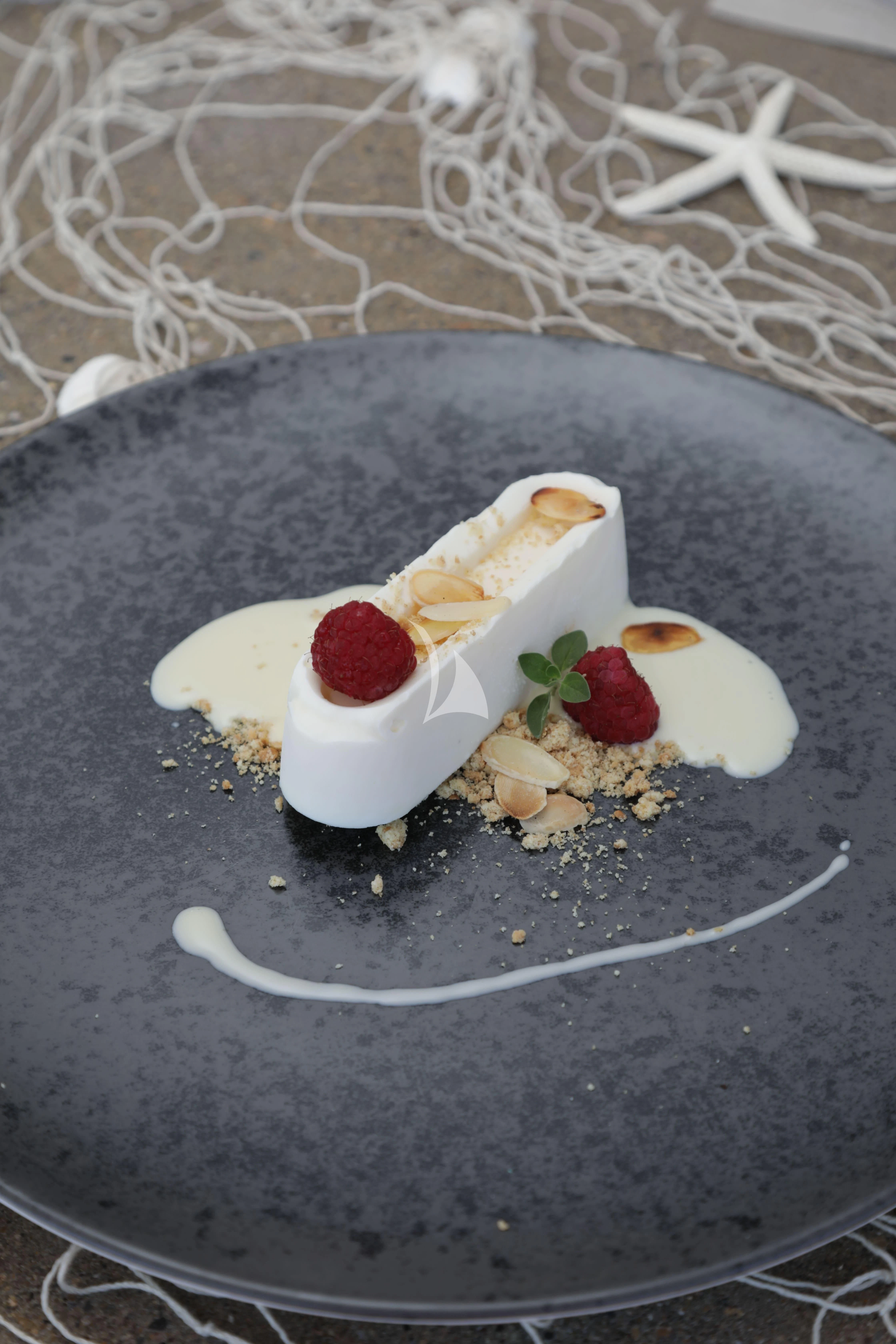a plate of dessert aboard TIREA Yacht for Sale