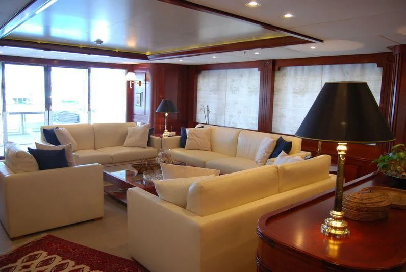 a living room with a large window aboard TIREA Yacht for Sale