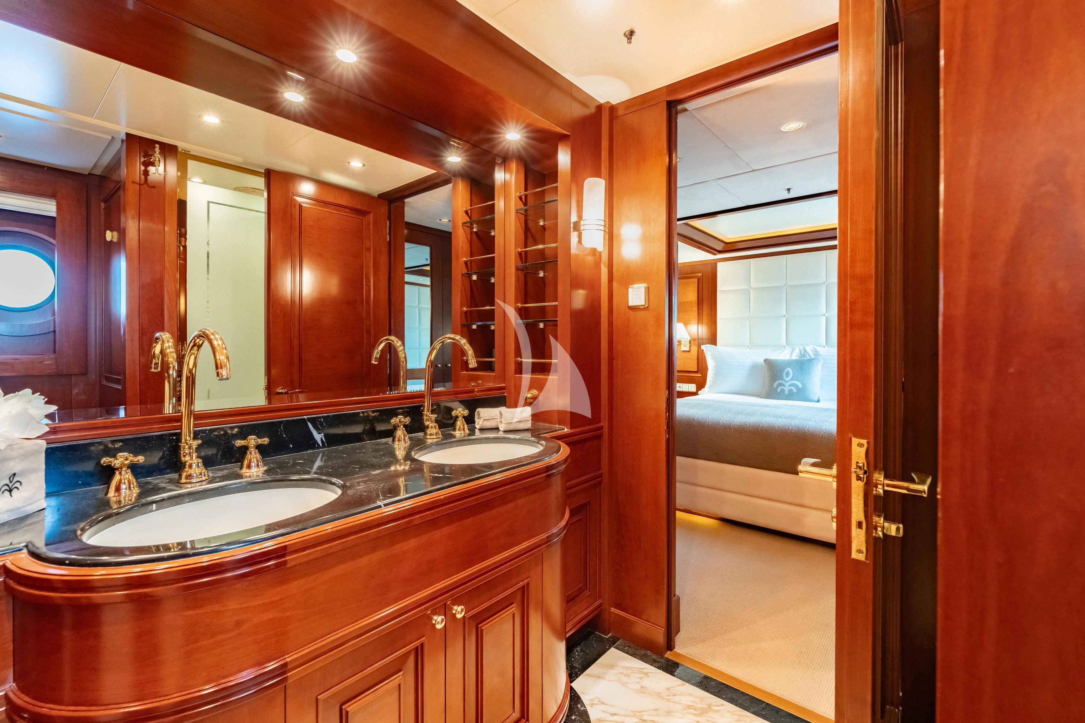 a bathroom with a sink and a mirror aboard TIREA Yacht for Sale