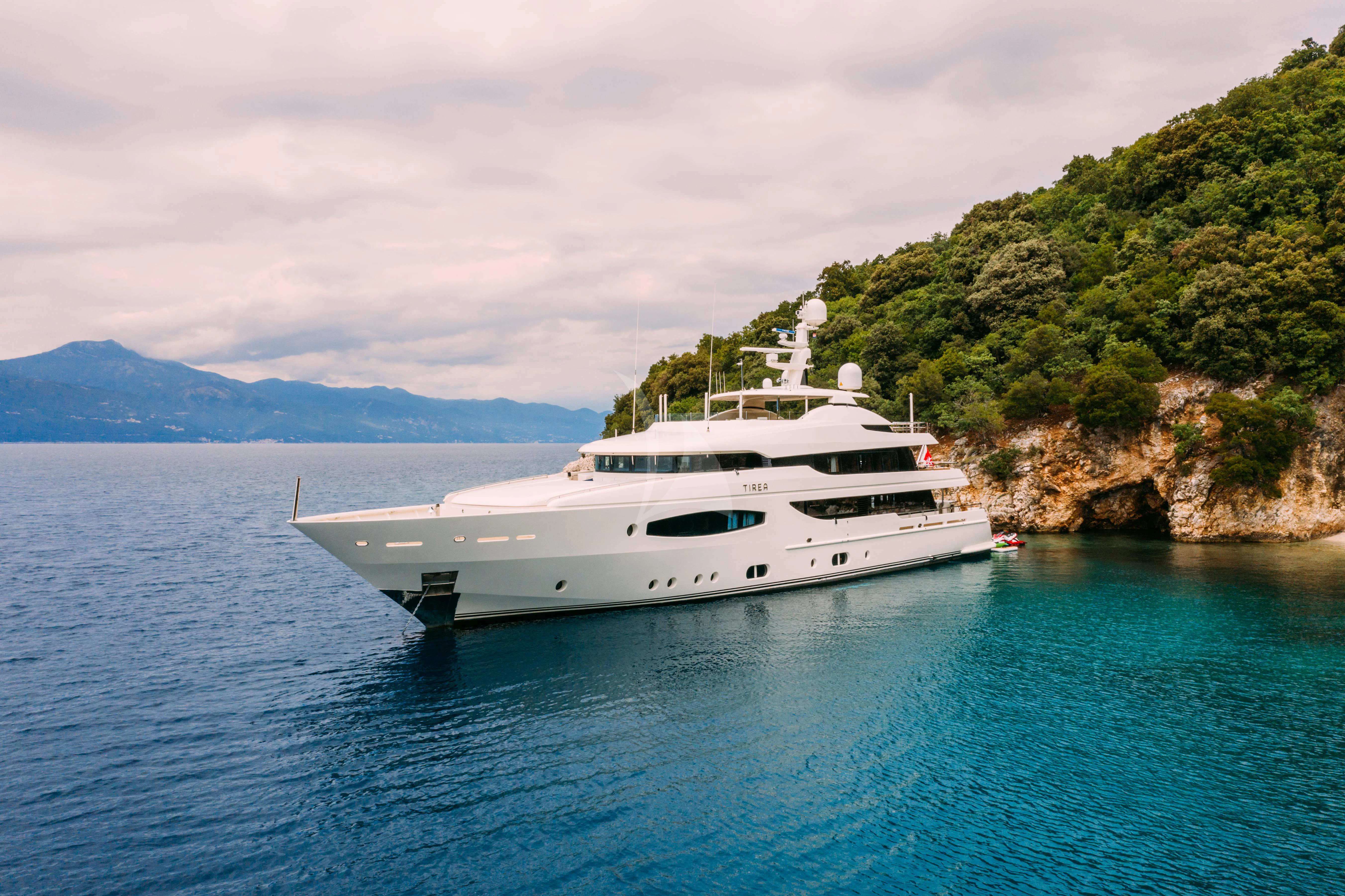 a white yacht in the water aboard TIREA Yacht for Sale