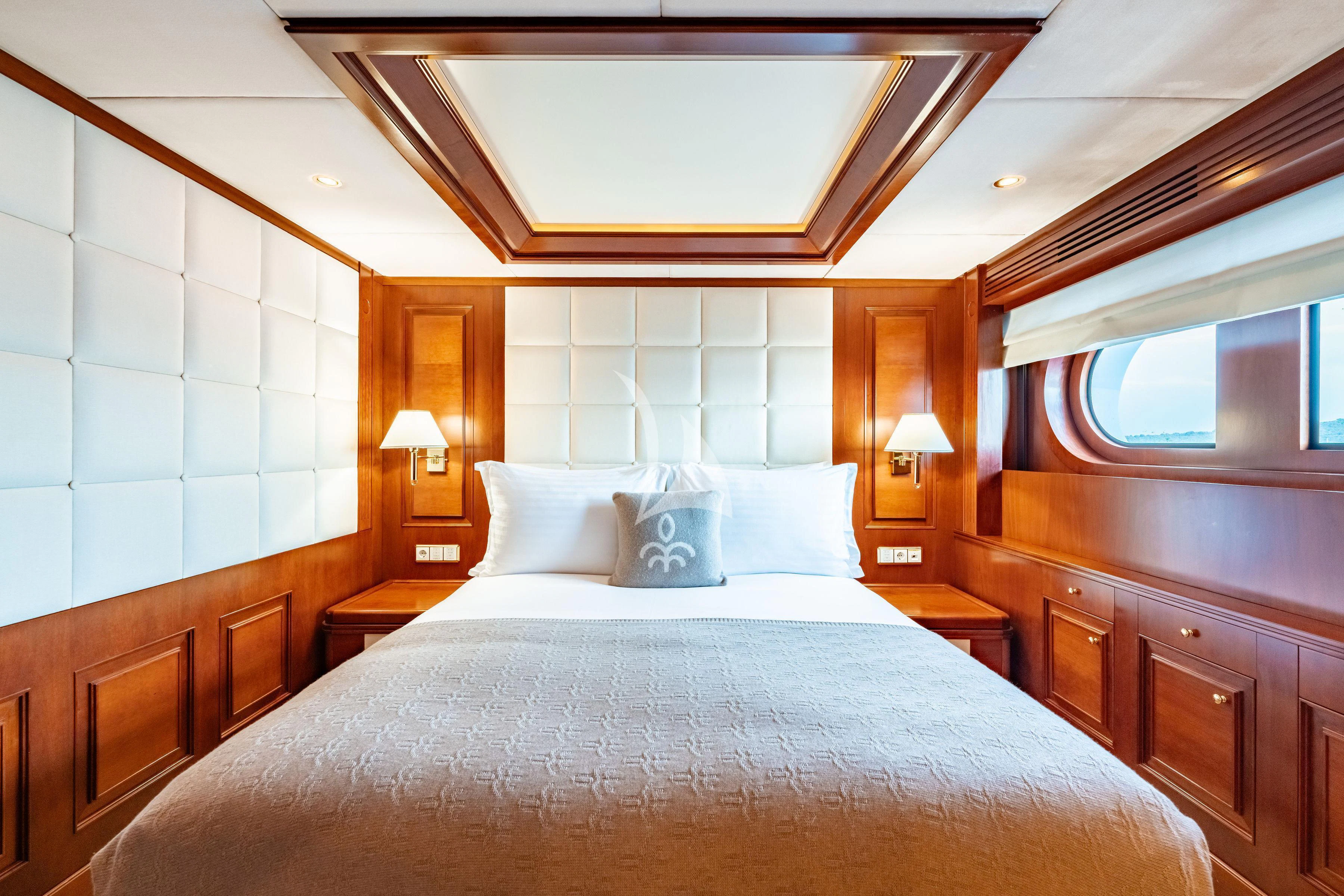 a bed with a large bed aboard TIREA Yacht for Sale