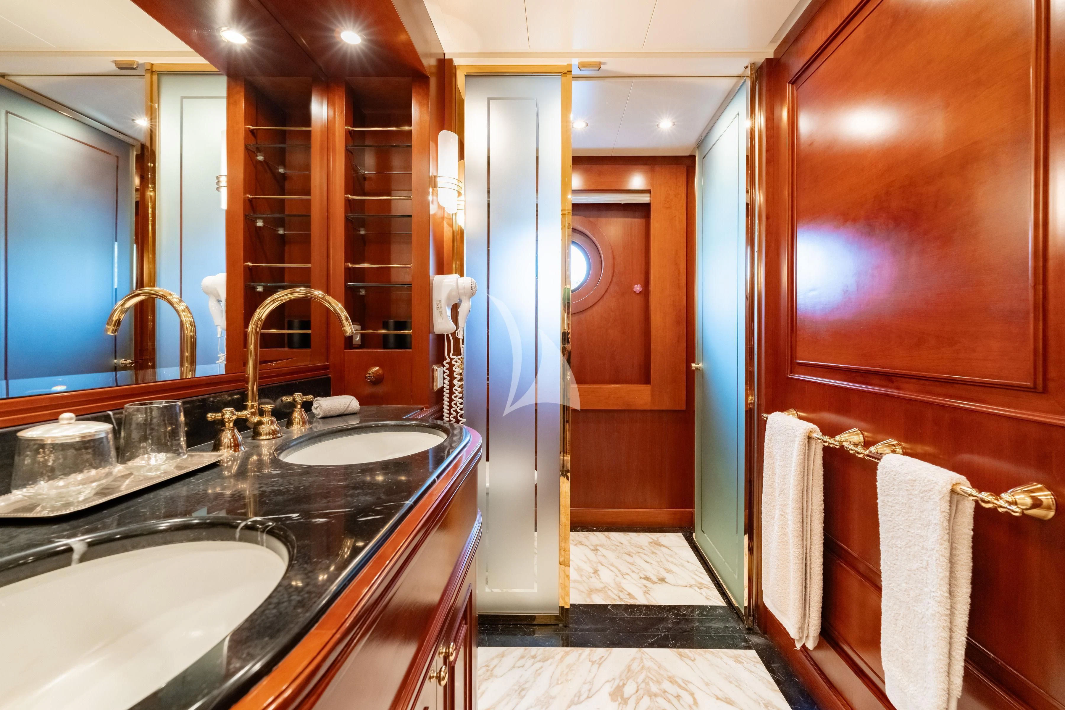 a bathroom with a sink and a mirror aboard TIREA Yacht for Sale