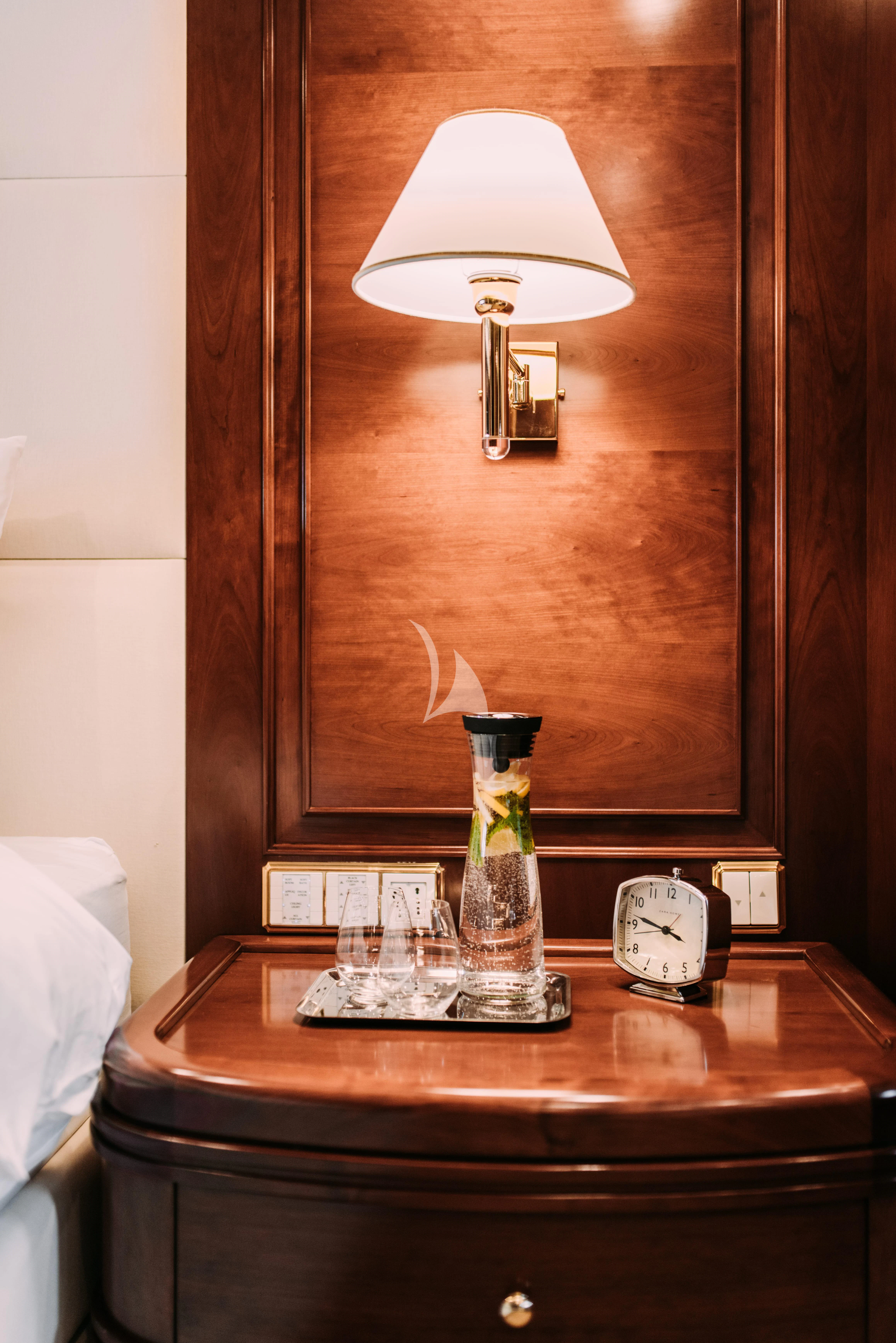 a lamp on a table aboard TIREA Yacht for Sale