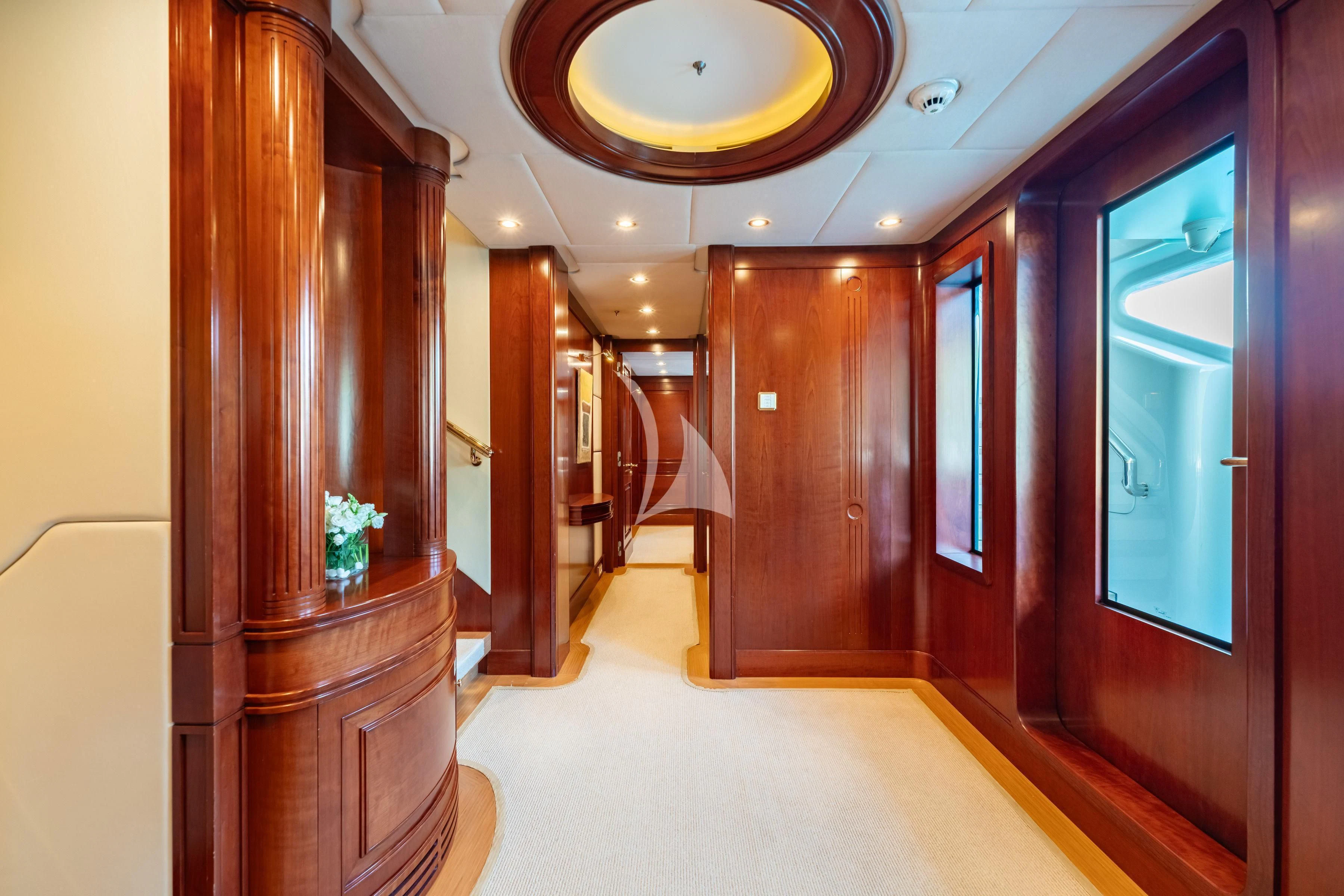 a hallway with doors aboard TIREA Yacht for Sale