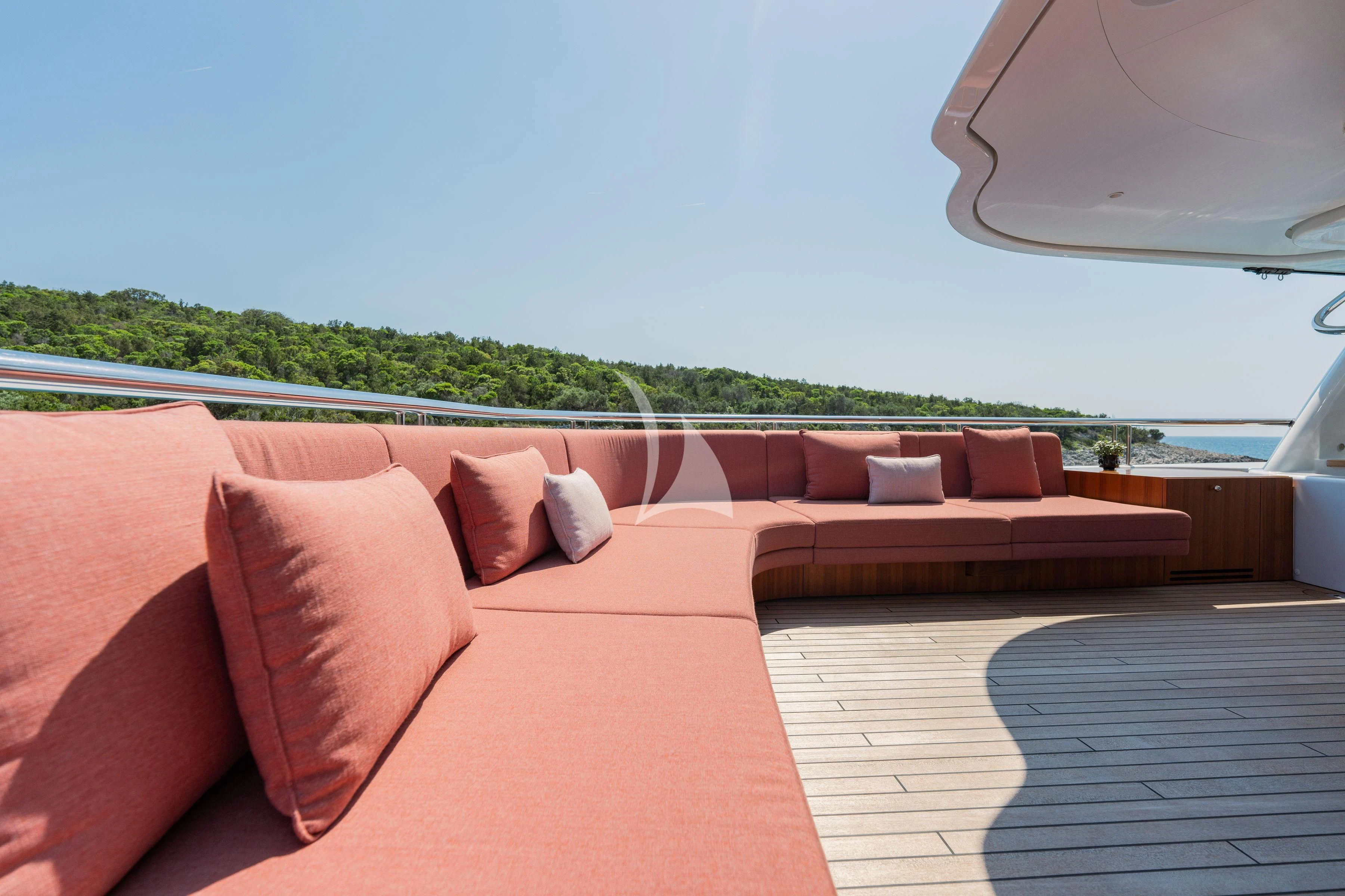 a couch with pillows on it aboard TIREA Yacht for Sale