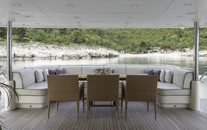 a room with a couch and chairs aboard TIREA Yacht for Sale