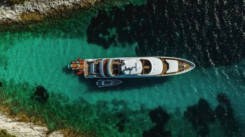 a car on a road aboard TIREA Yacht for Sale
