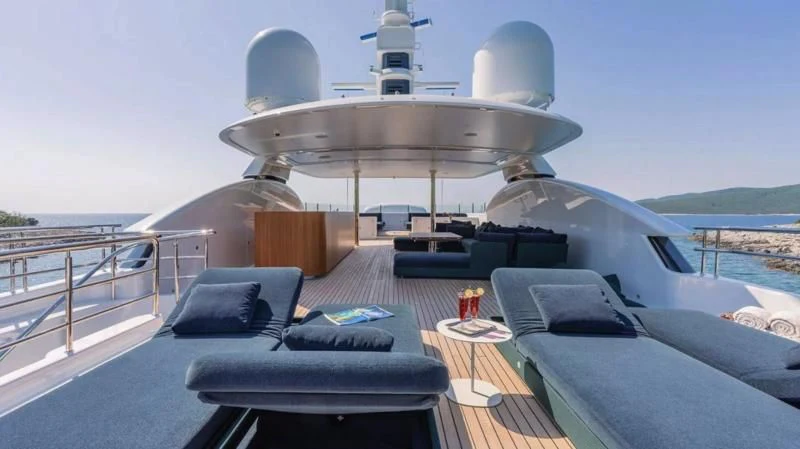a large white space ship on a deck with a pool and a pool aboard TIREA Yacht for Sale