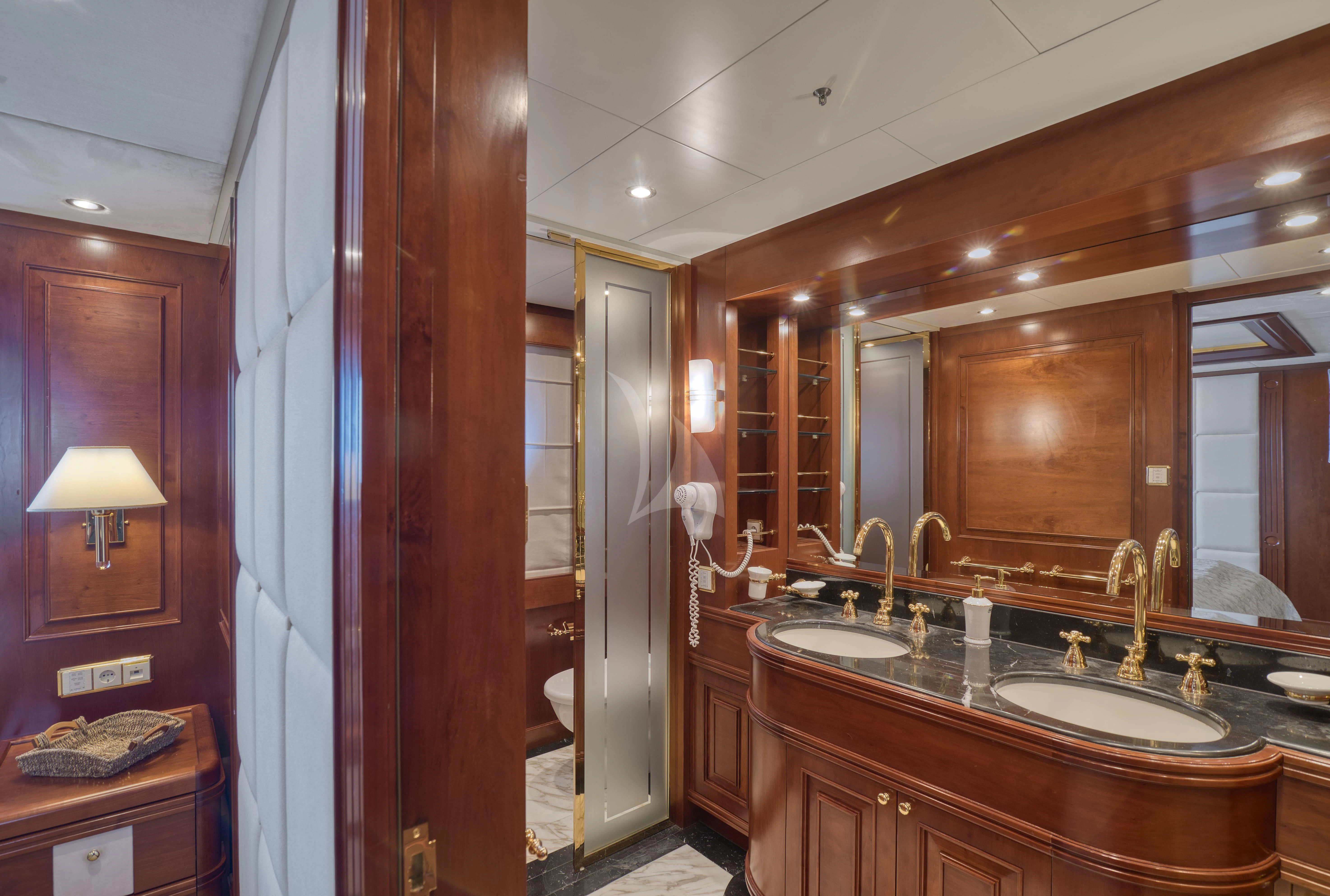 a bathroom with a sink and a mirror aboard TIREA Yacht for Sale