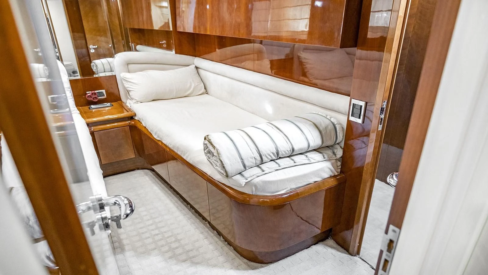 a bed in a room aboard TITAN Yacht for Sale