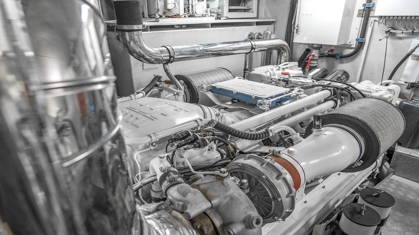 a car engine with a few parts aboard TITAN Yacht for Sale