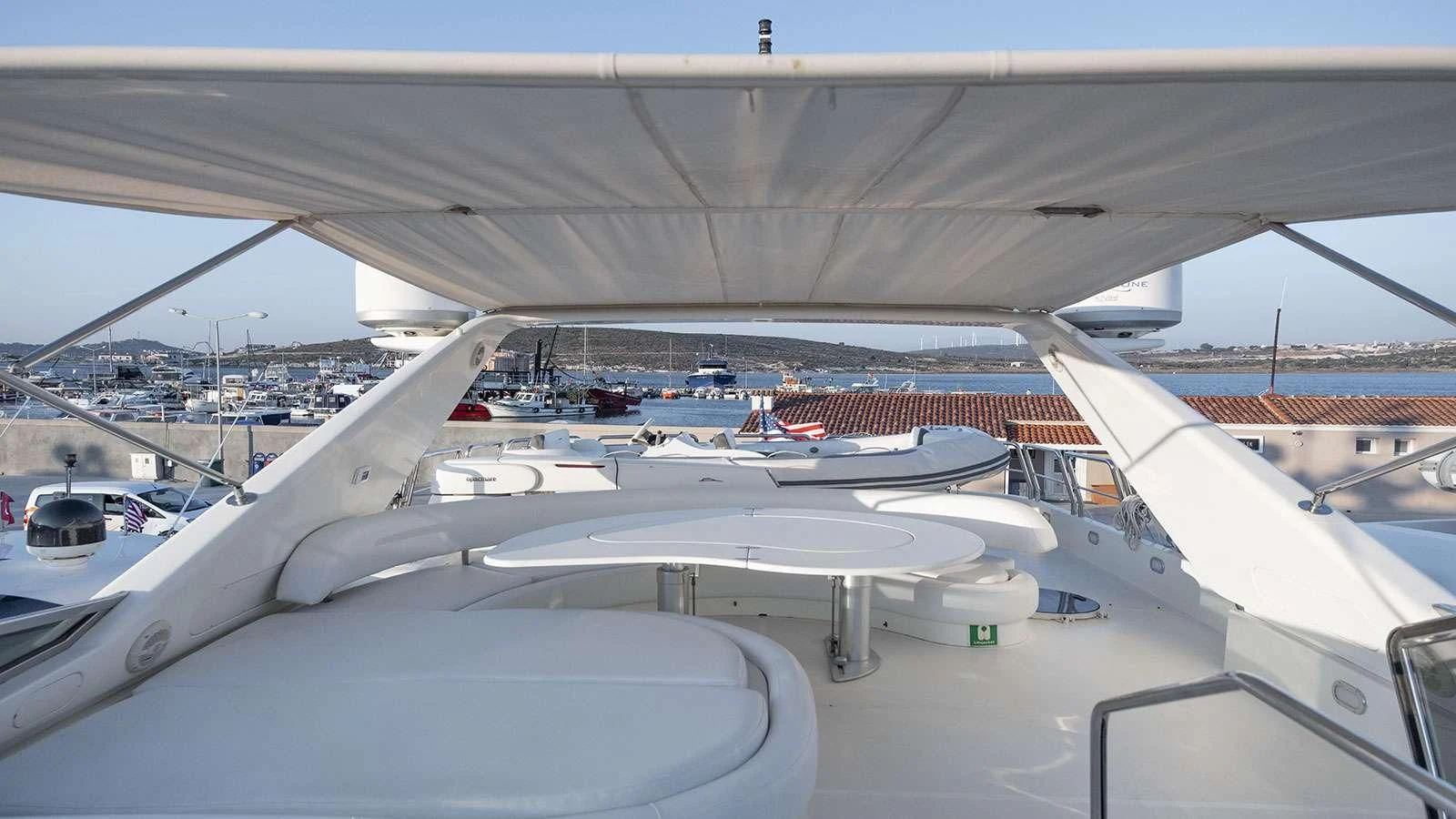 a plane parked at an airport aboard TITAN Yacht for Sale