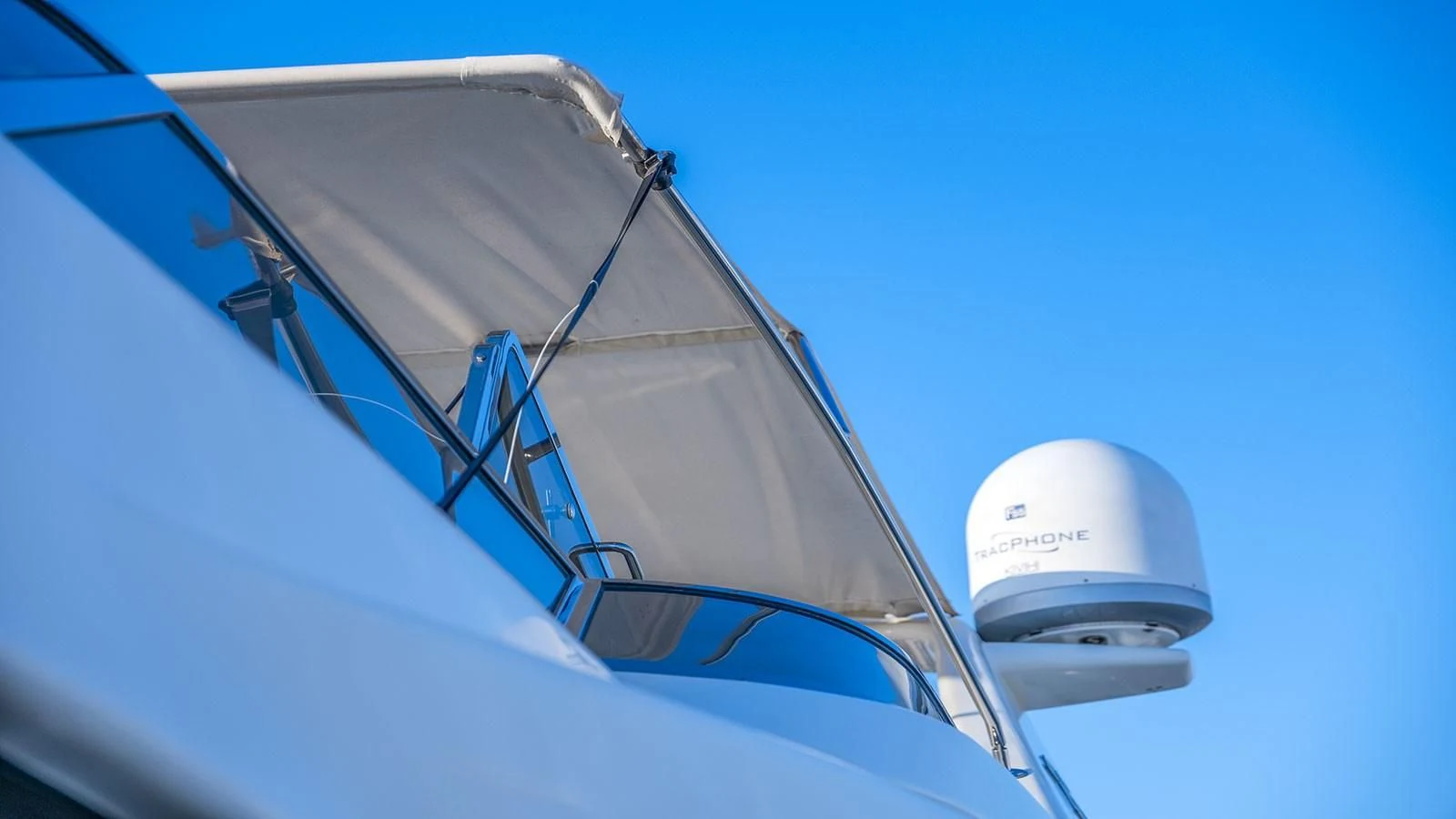 a close-up of a white yacht aboard TITAN Yacht for Sale