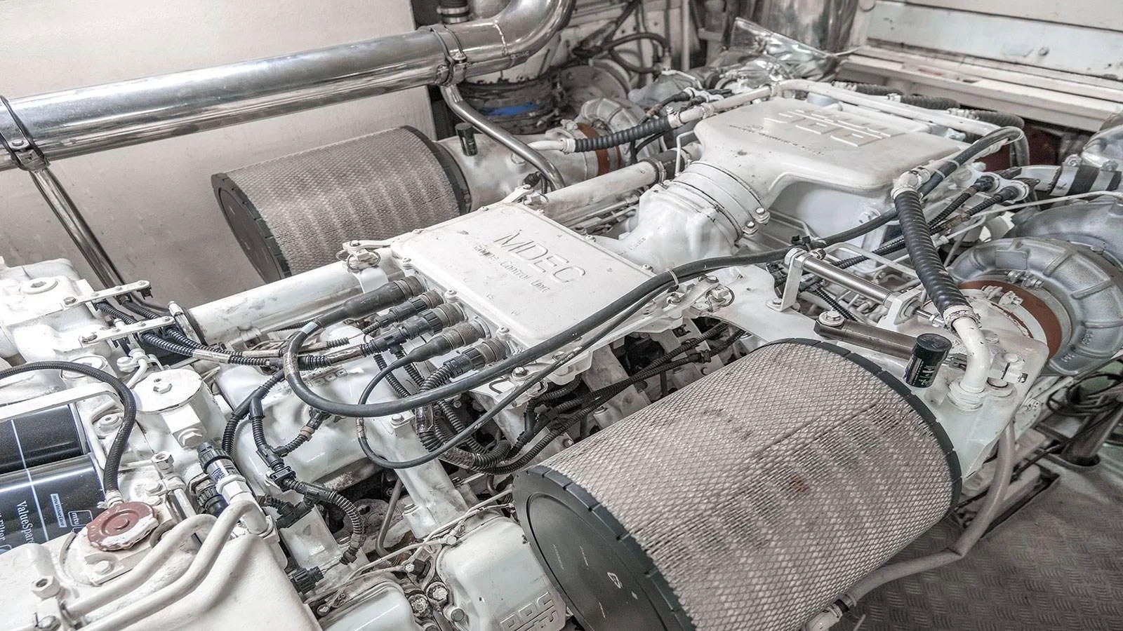 a car engine with a hood aboard TITAN Yacht for Sale