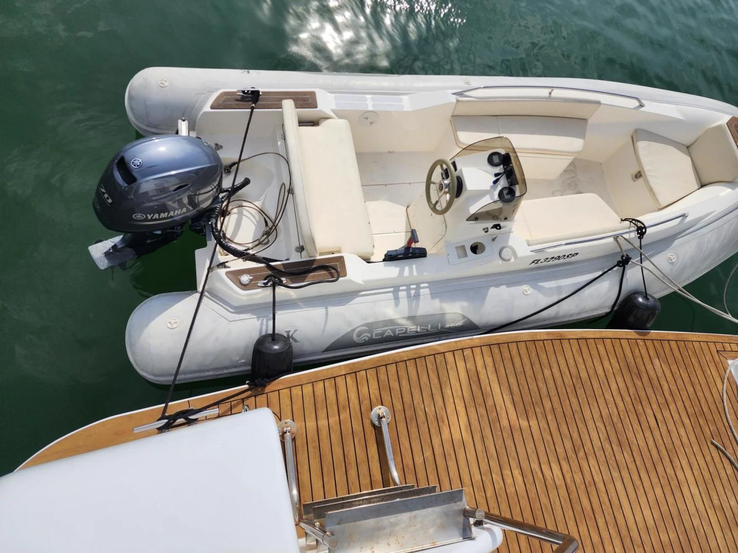 a boat with a steering wheel aboard K Yacht for Sale