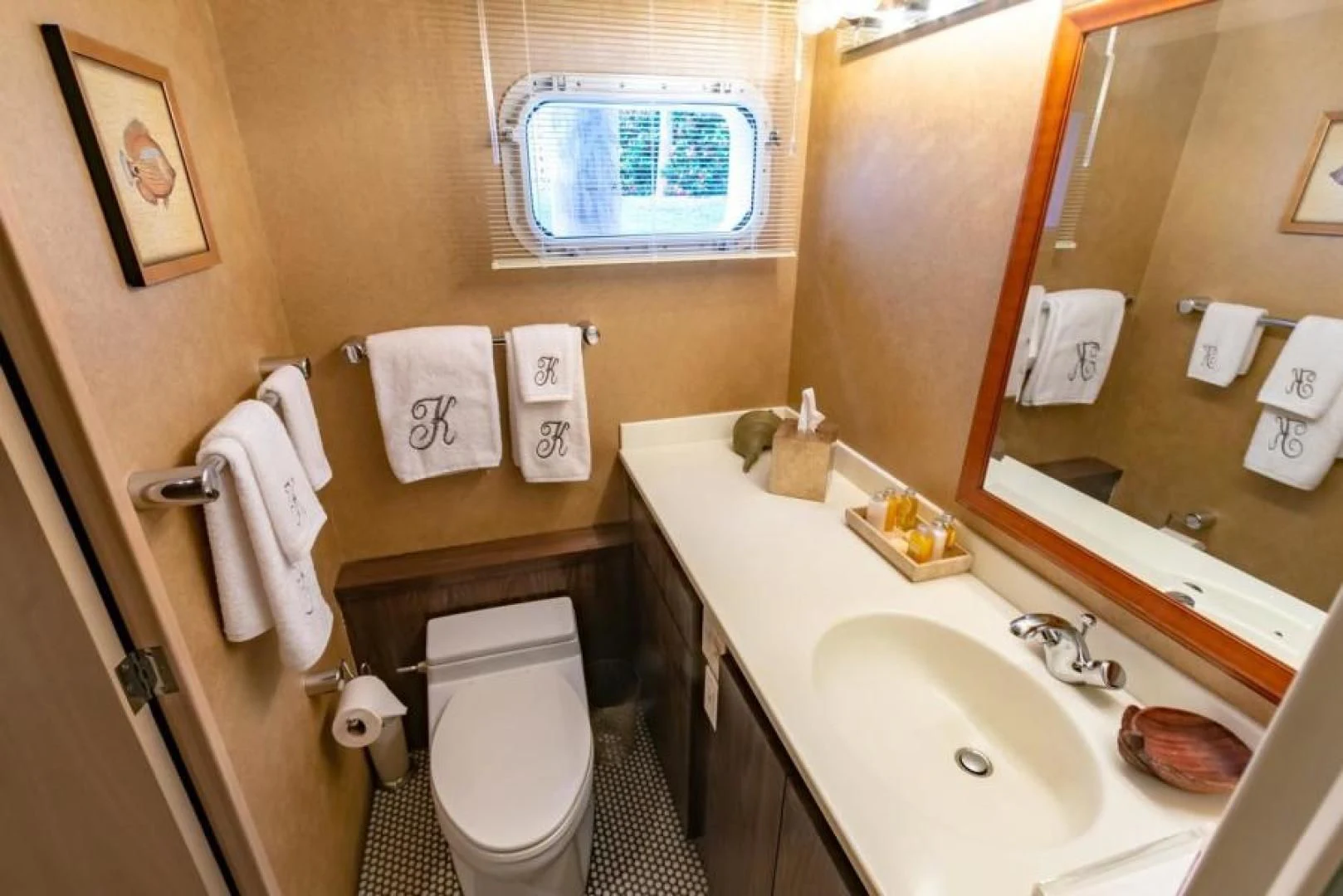 a bathroom with a toilet and sink aboard K Yacht for Sale