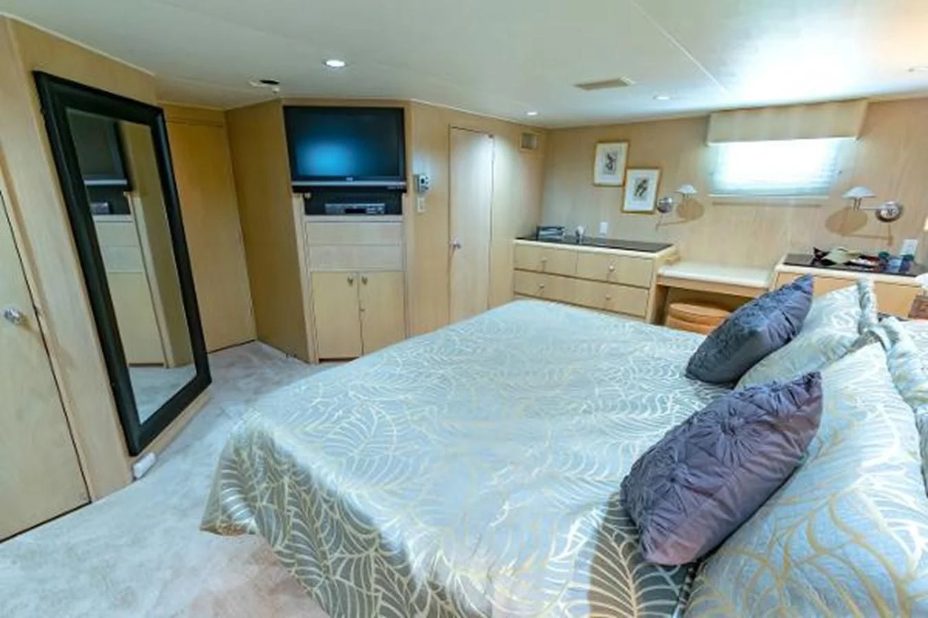 a bed in a bedroom aboard K Yacht for Sale