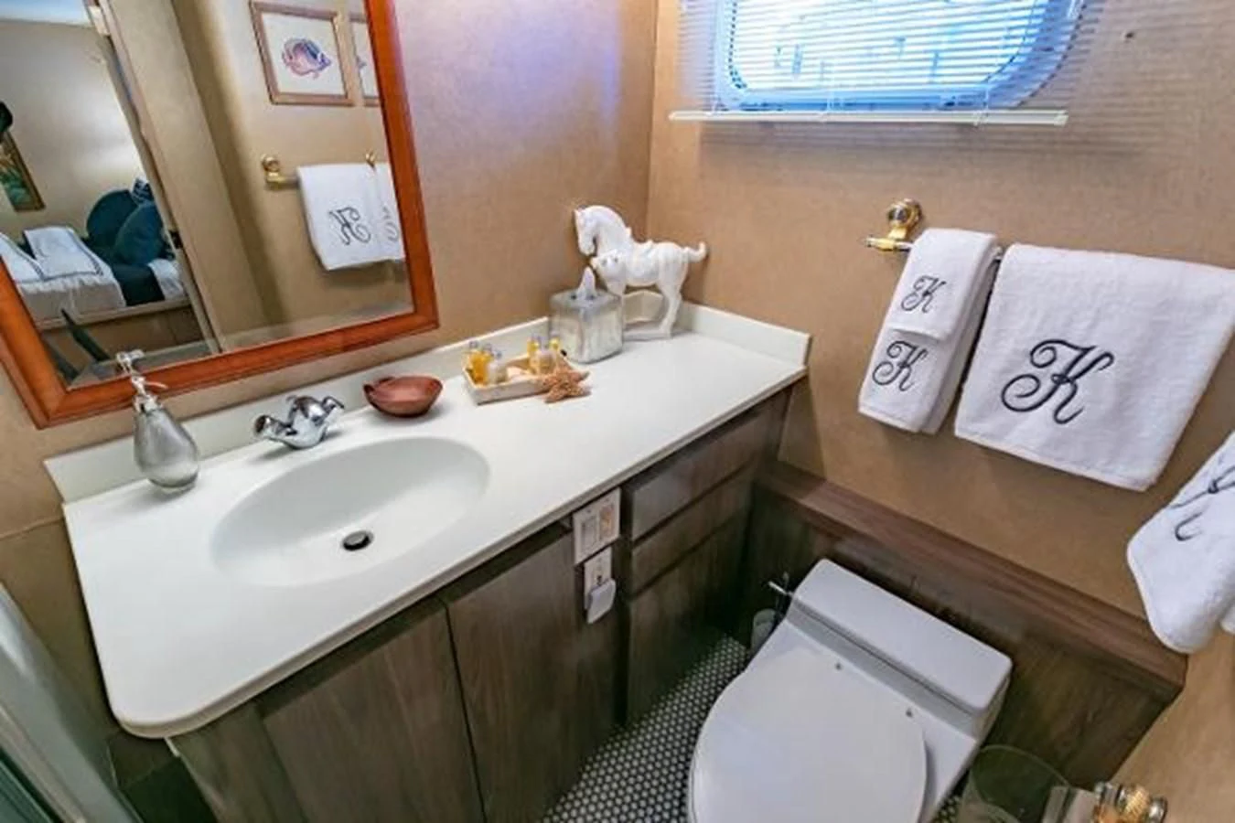 a bathroom with a sink and toilet aboard K Yacht for Sale