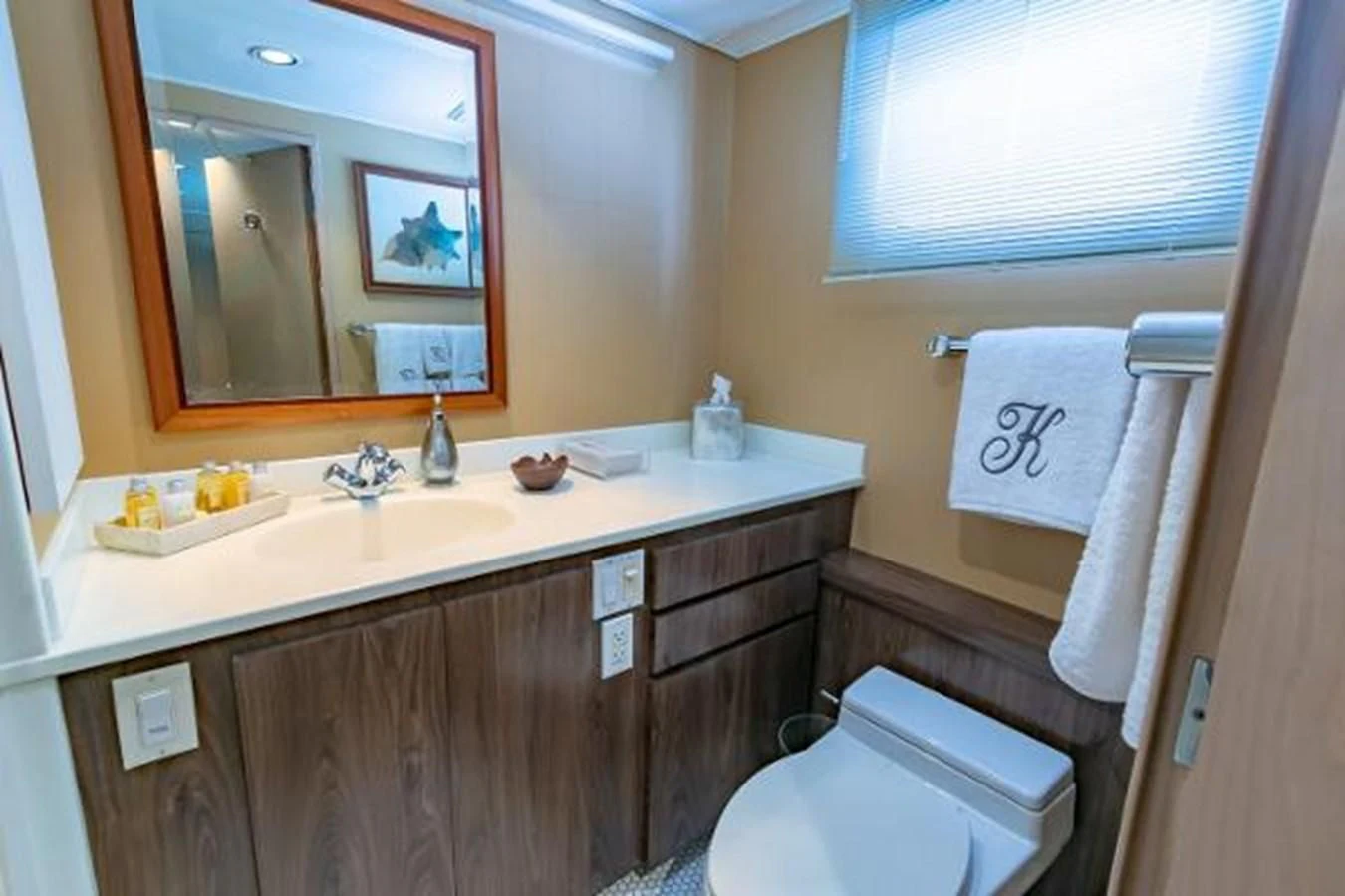 a bathroom with a sink and a toilet aboard K Yacht for Sale