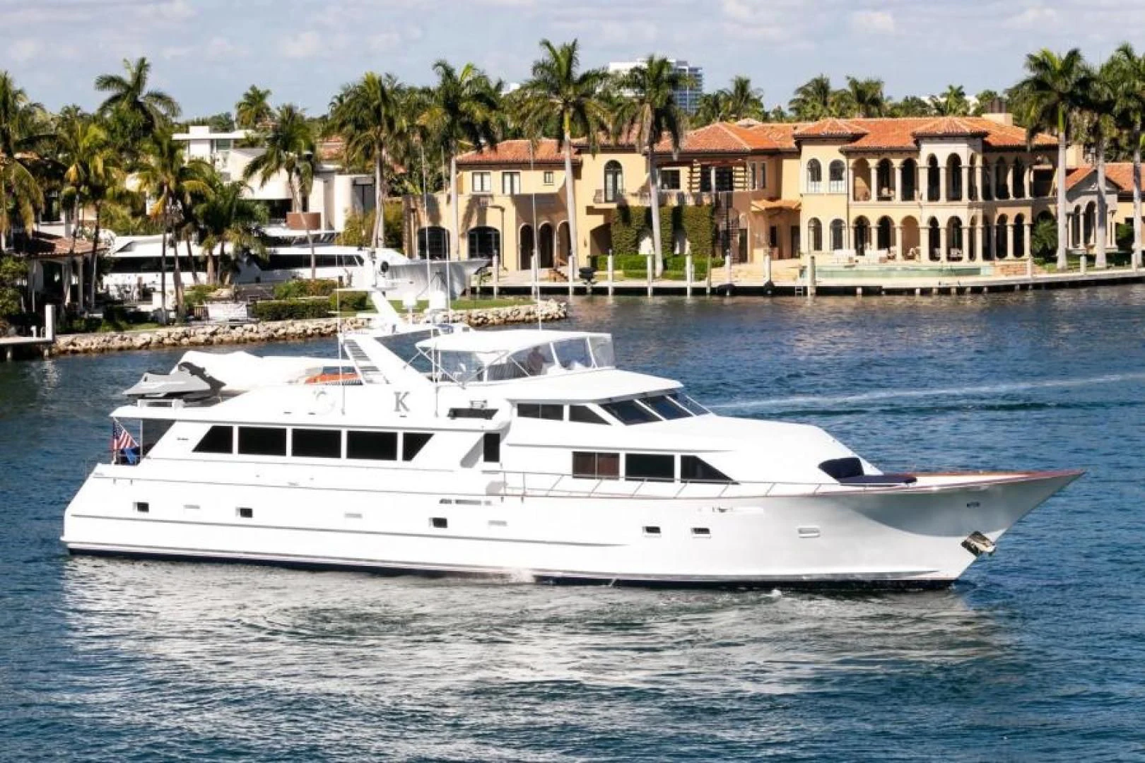 a white yacht in the water aboard K Yacht for Sale