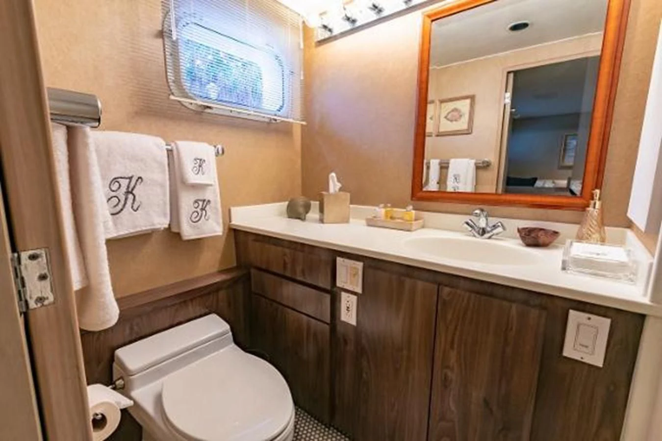 a bathroom with a sink and toilet aboard K Yacht for Sale
