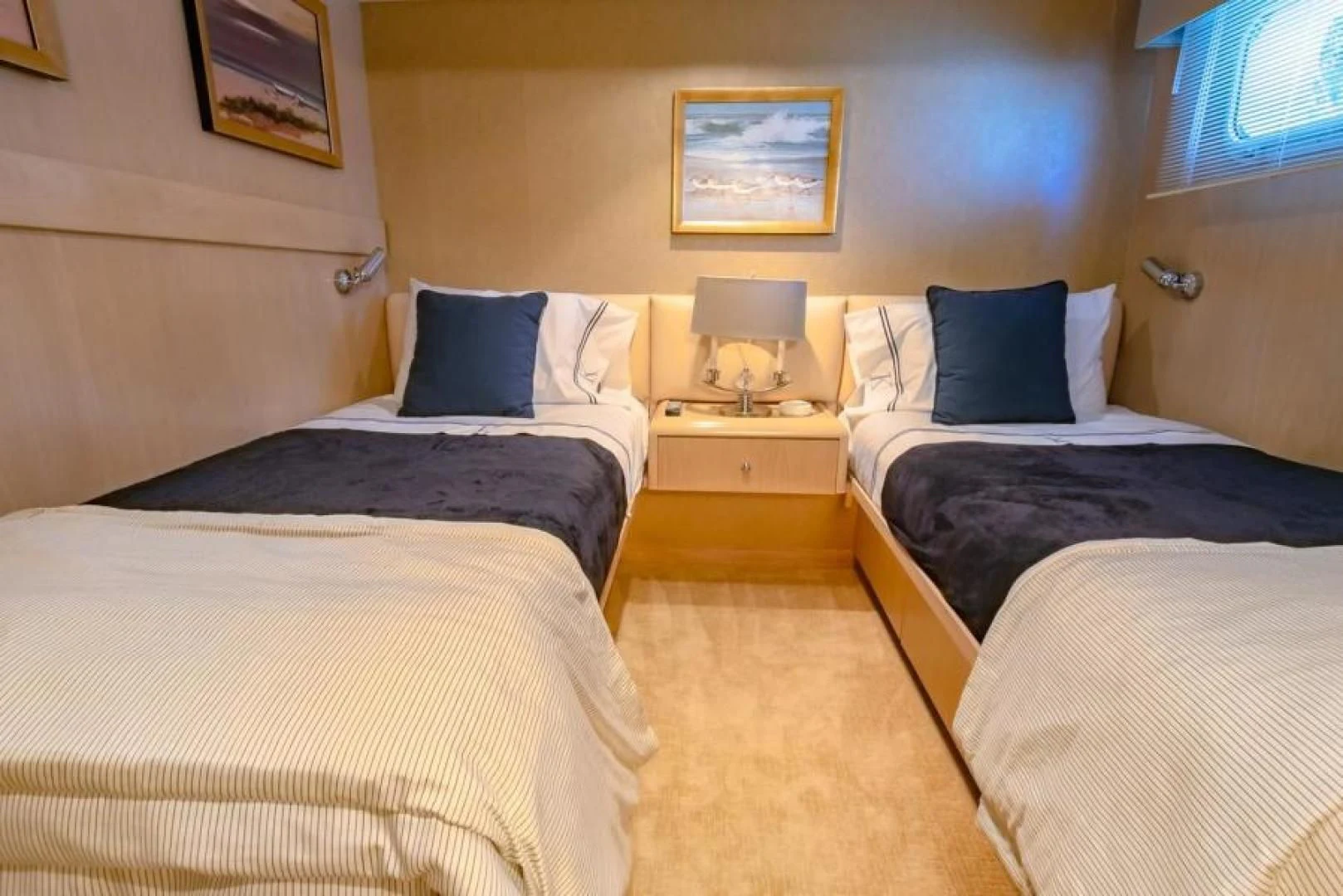 a room with two beds aboard K Yacht for Sale