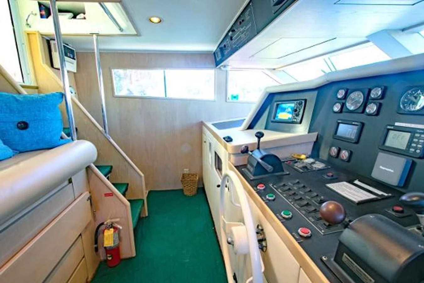 a room with a green carpet and a green mat on the floor aboard K Yacht for Sale