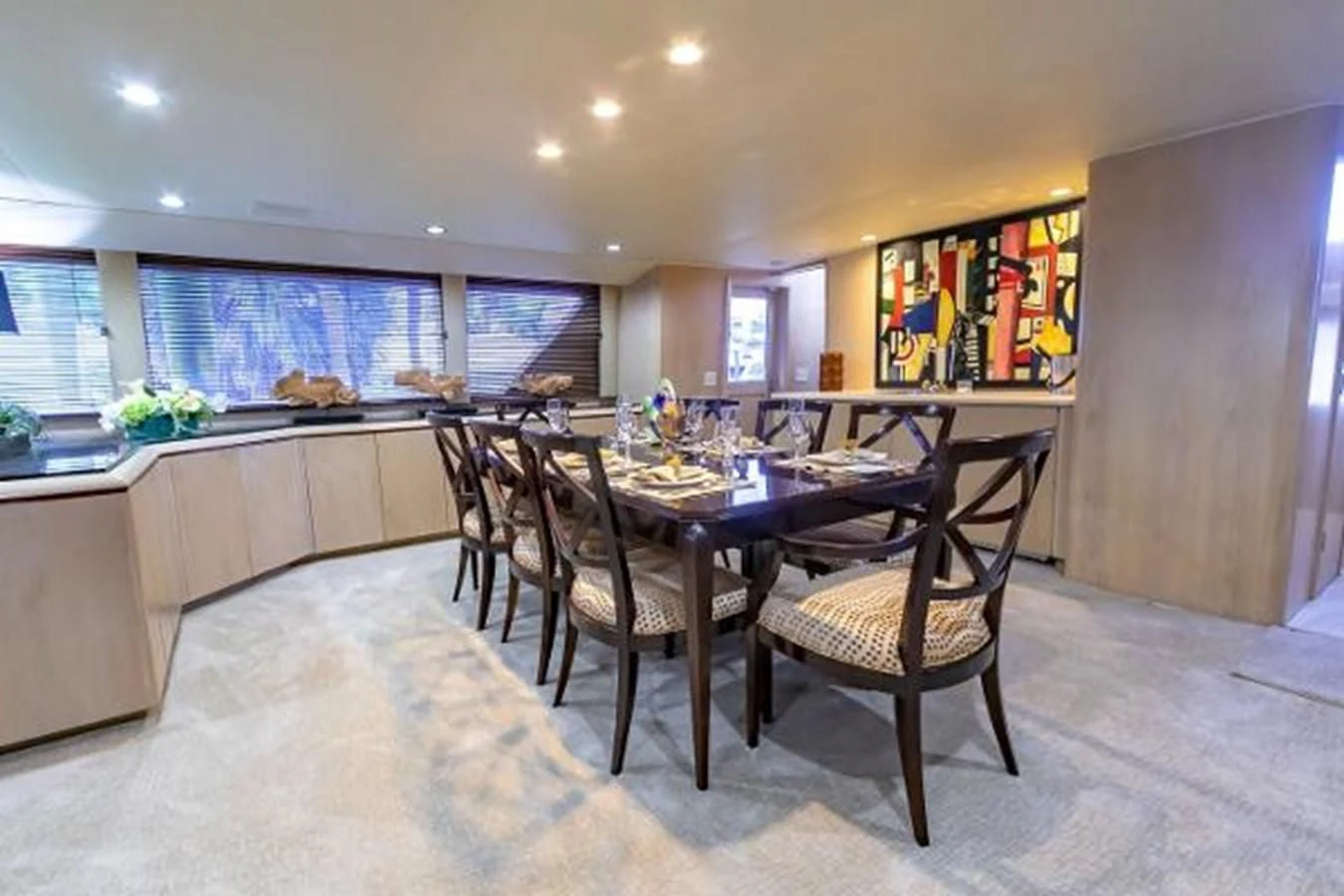 a dining room with a table and chairs aboard K Yacht for Sale