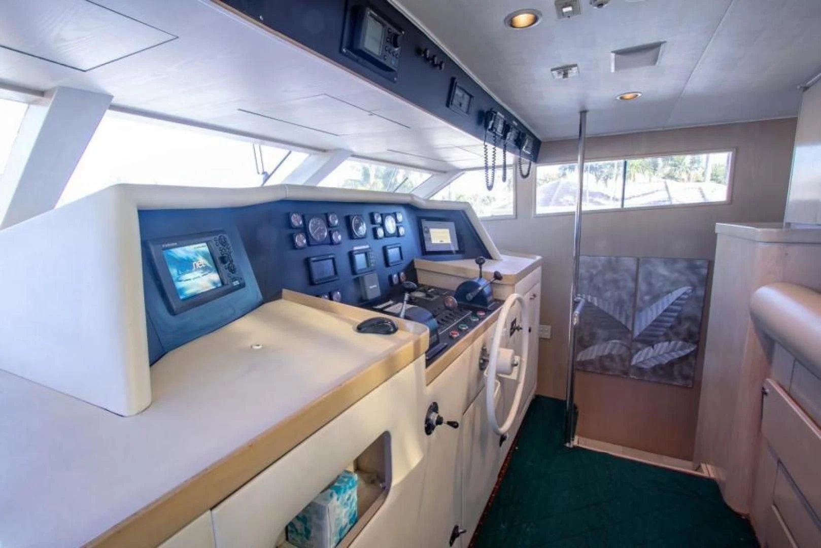 a room with a machine aboard K Yacht for Sale